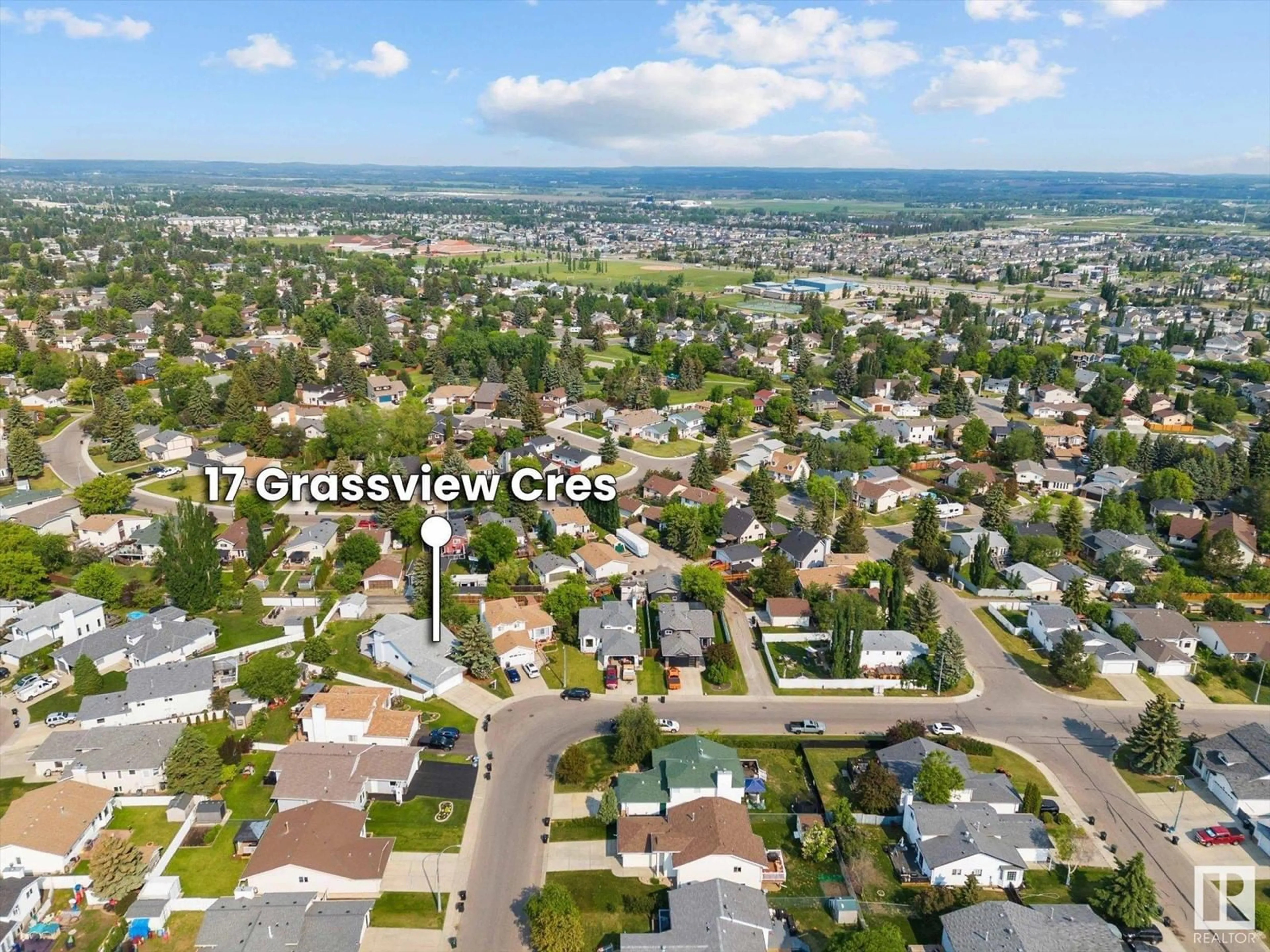 A pic from outside/outdoor area/front of a property/back of a property/a pic from drone, mountain view for 17 GRASSVIEW CR, Spruce Grove Alberta T7X3H3
