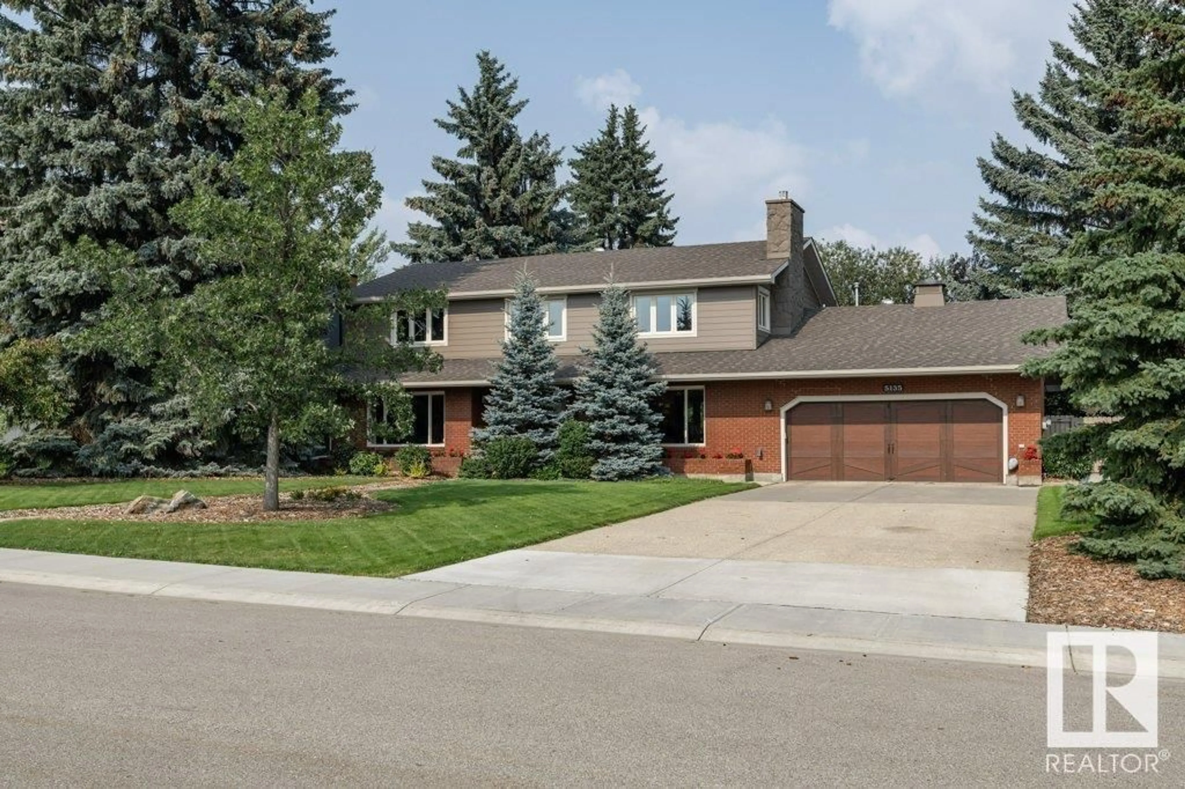 Home with brick exterior material, street for 5135 LANSDOWNE DR, Edmonton Alberta T6H4L1