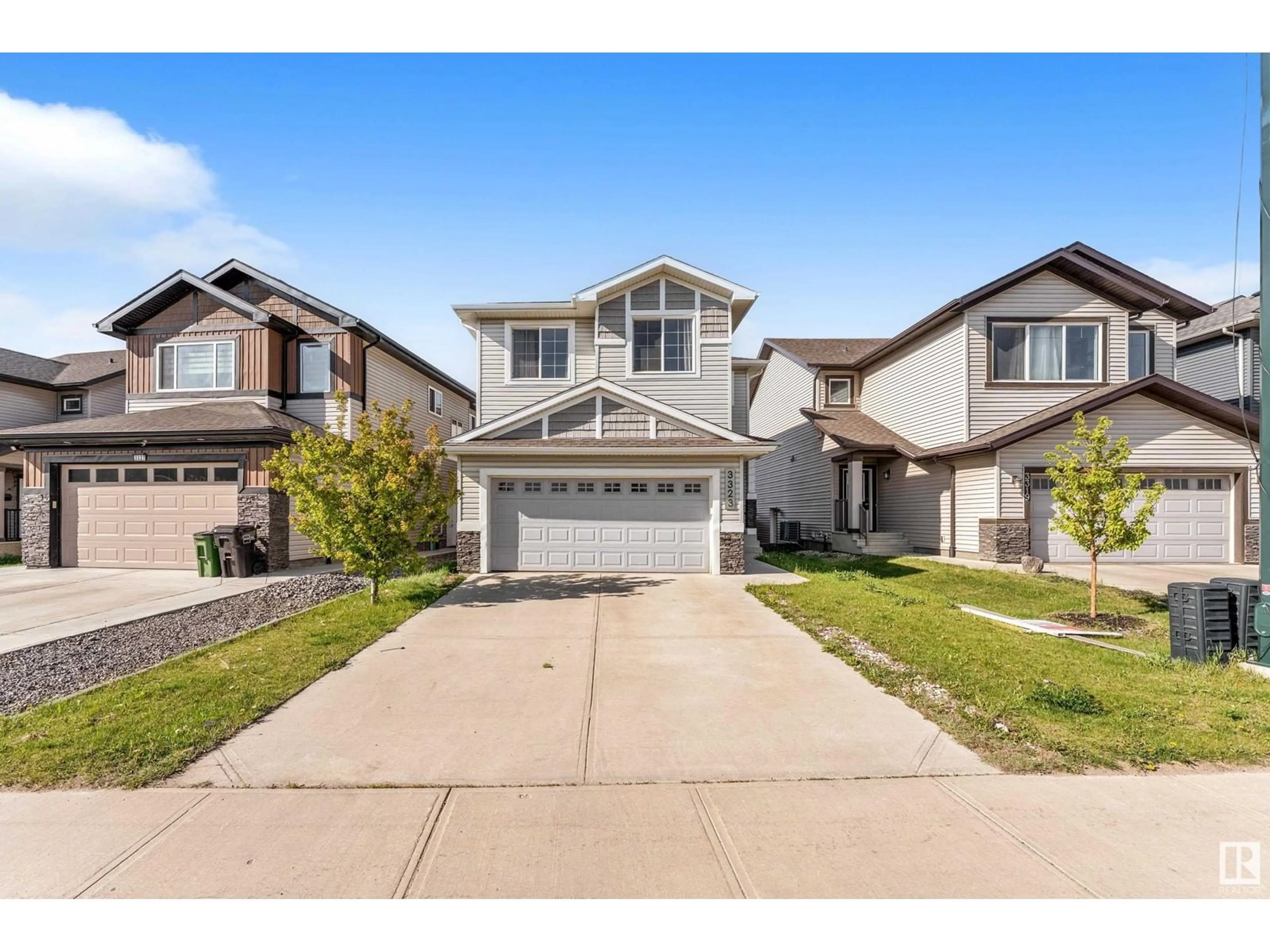 Home with vinyl exterior material, street for 3323 8 ST, Edmonton Alberta T6T1A4