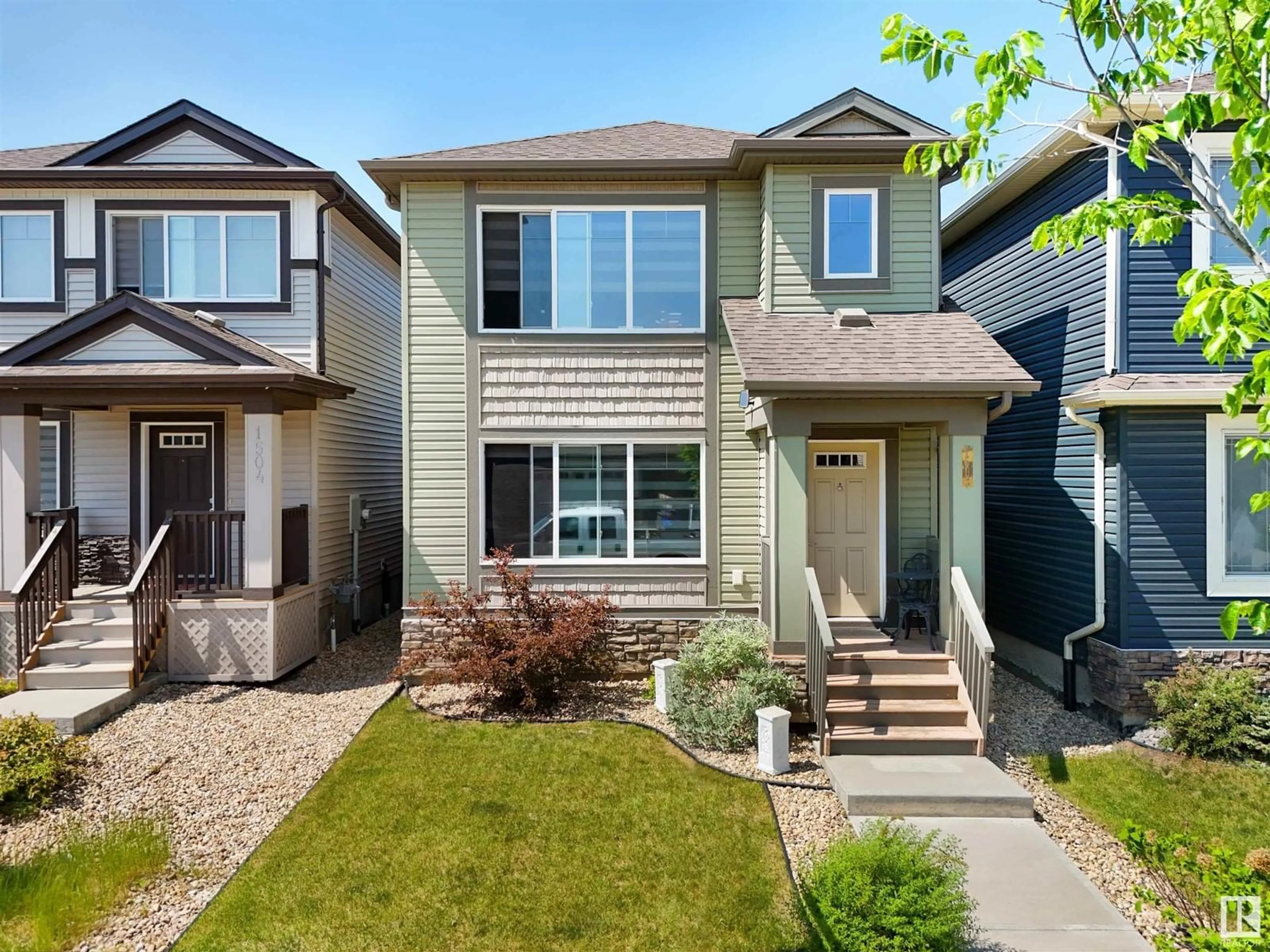 Home with vinyl exterior material, street for NW - 1508 21 ST, Edmonton Alberta T6T1B2
