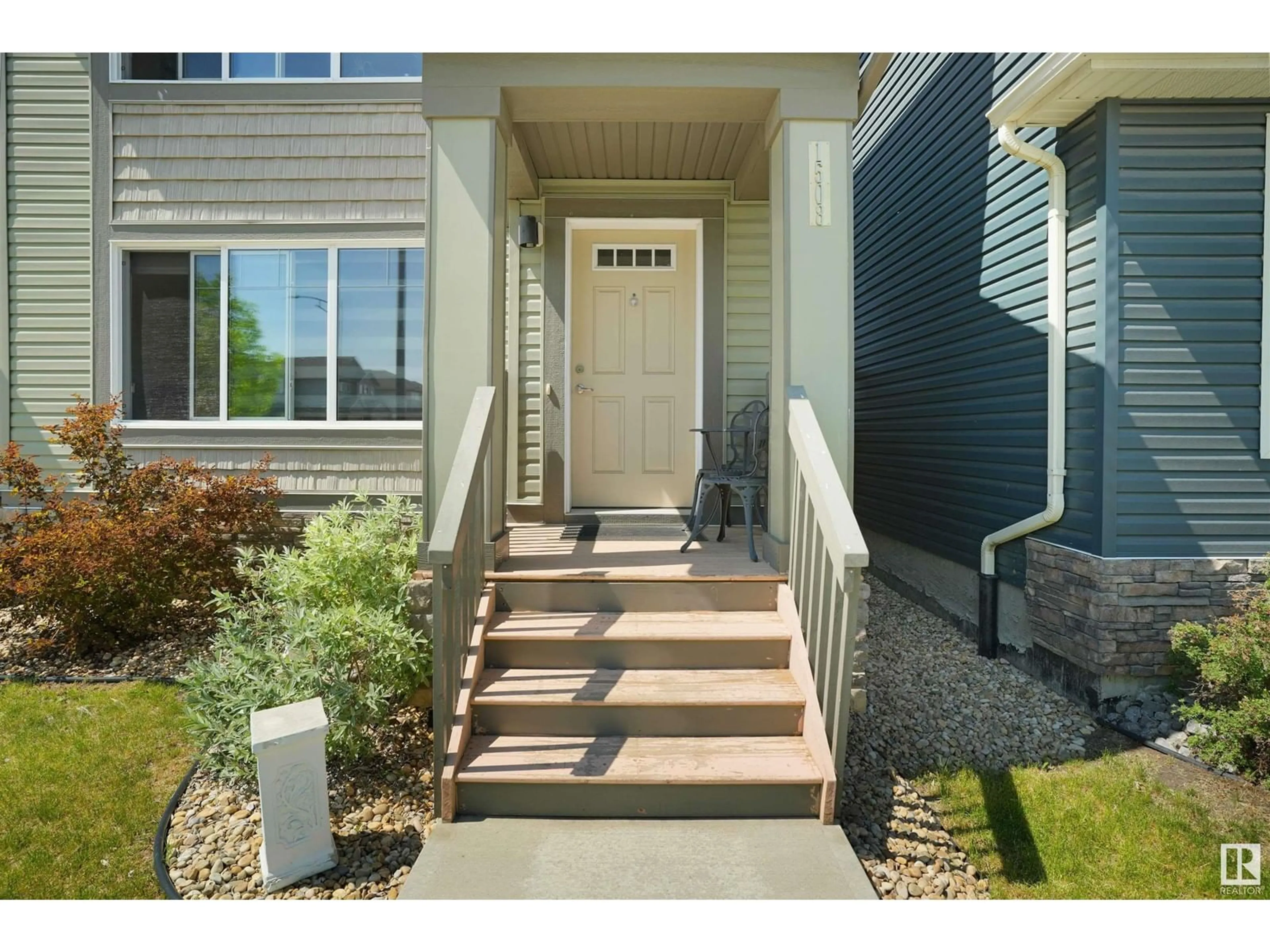 Home with vinyl exterior material, street for NW - 1508 21 ST, Edmonton Alberta T6T1B2