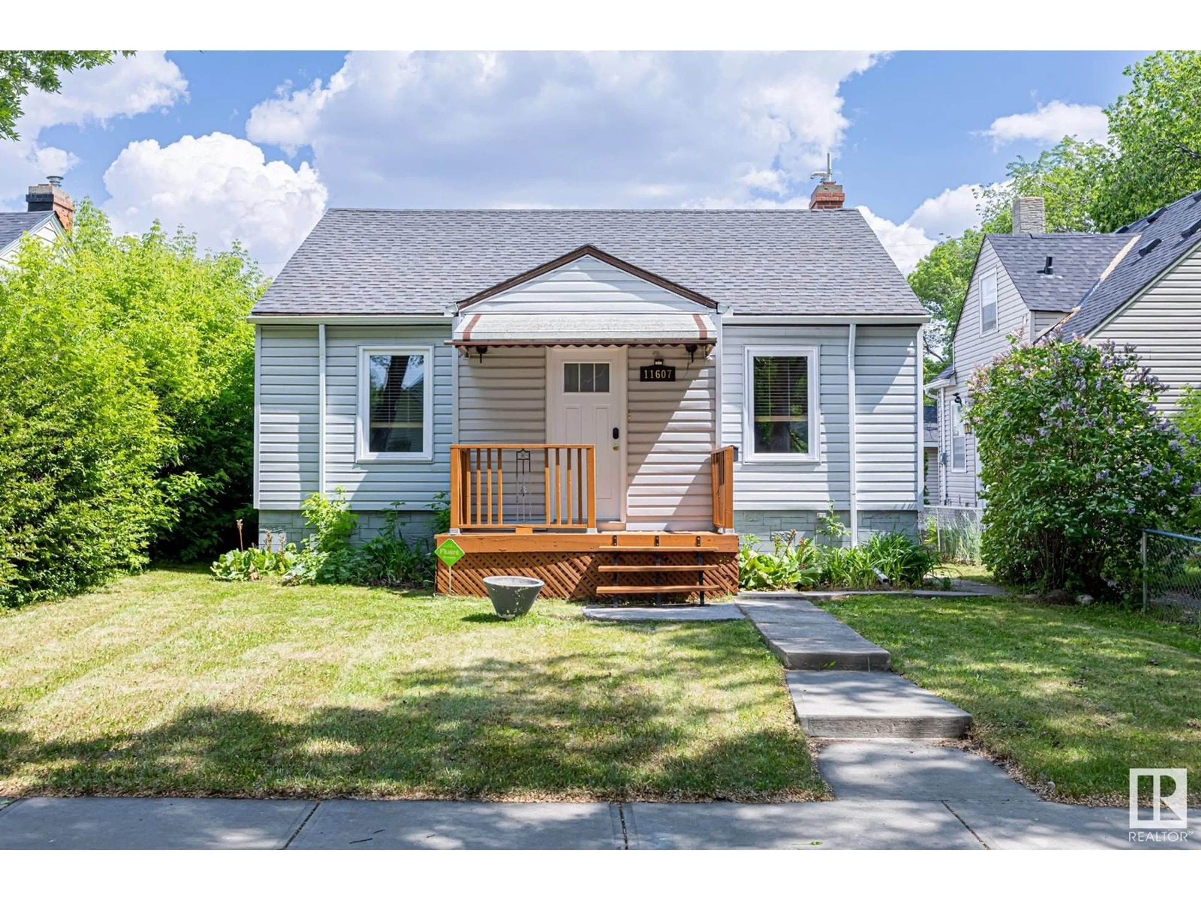 Home with vinyl exterior material, street for NW - 11607 87 ST, Edmonton Alberta T5B3M6