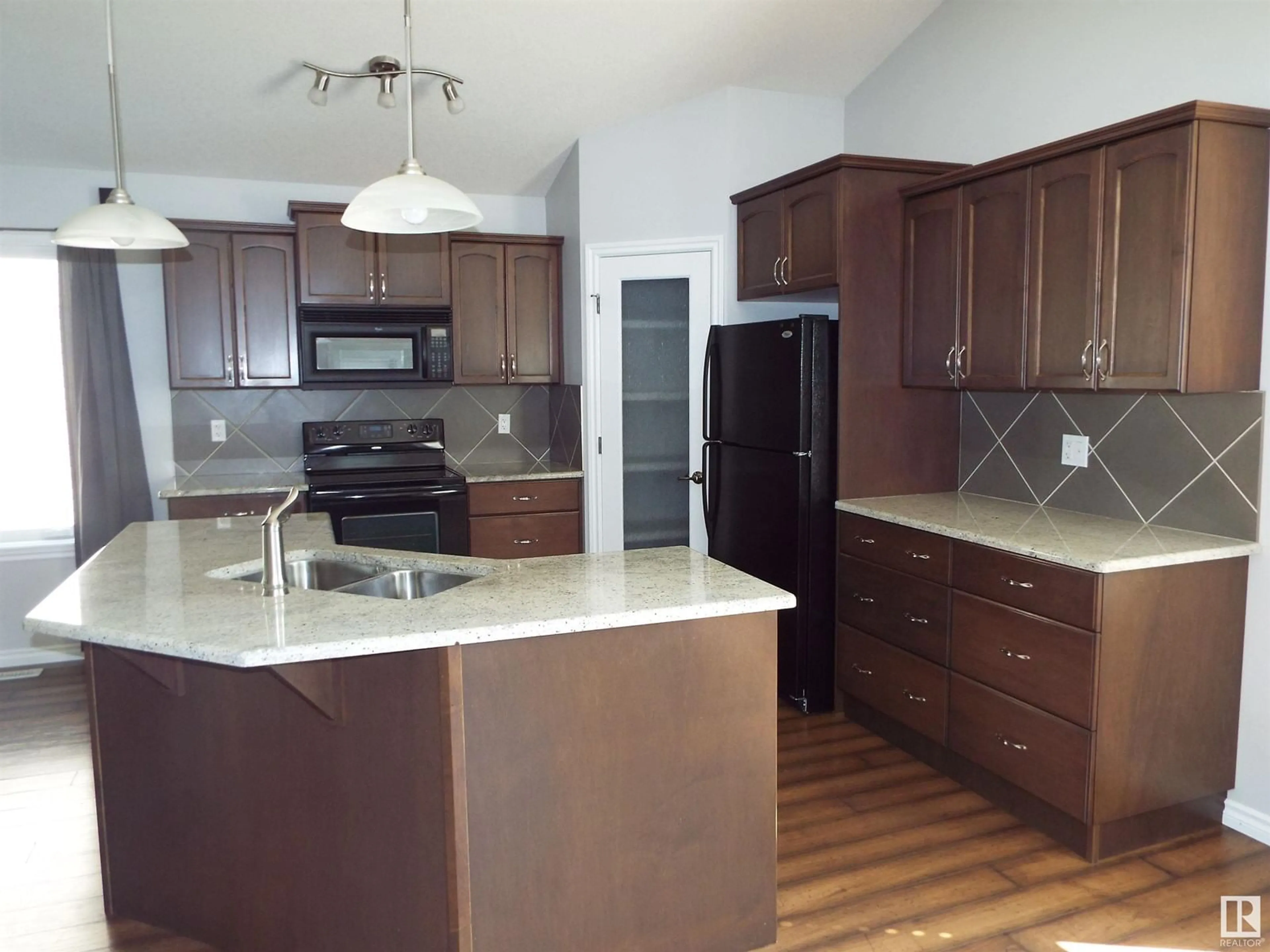 Open concept kitchen, unknown for 145 SELKIRK PL, Leduc Alberta T9E0L6