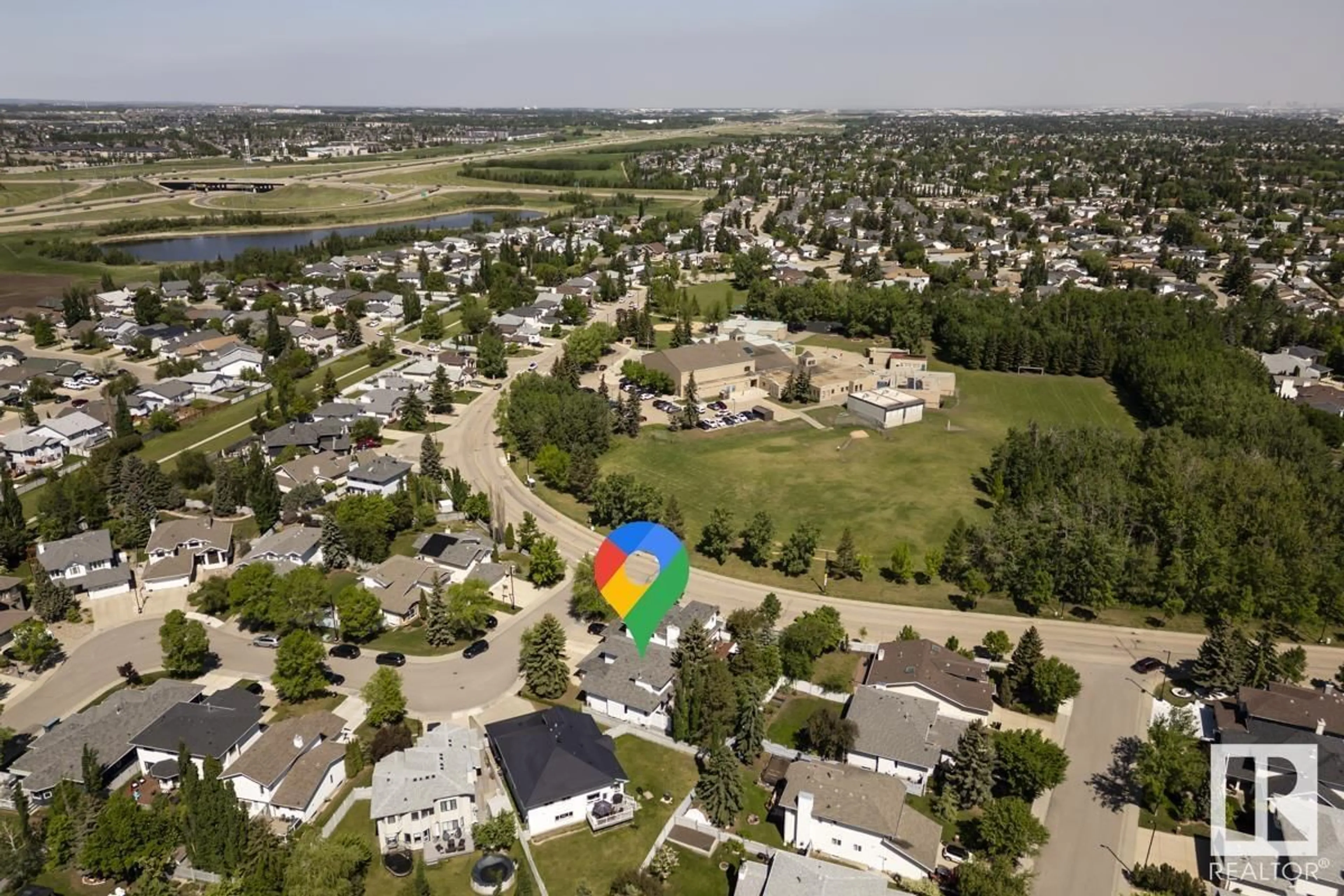 A pic from outside/outdoor area/front of a property/back of a property/a pic from drone, water/lake/river/ocean view for 5151 189 ST, Edmonton Alberta T6M2L1