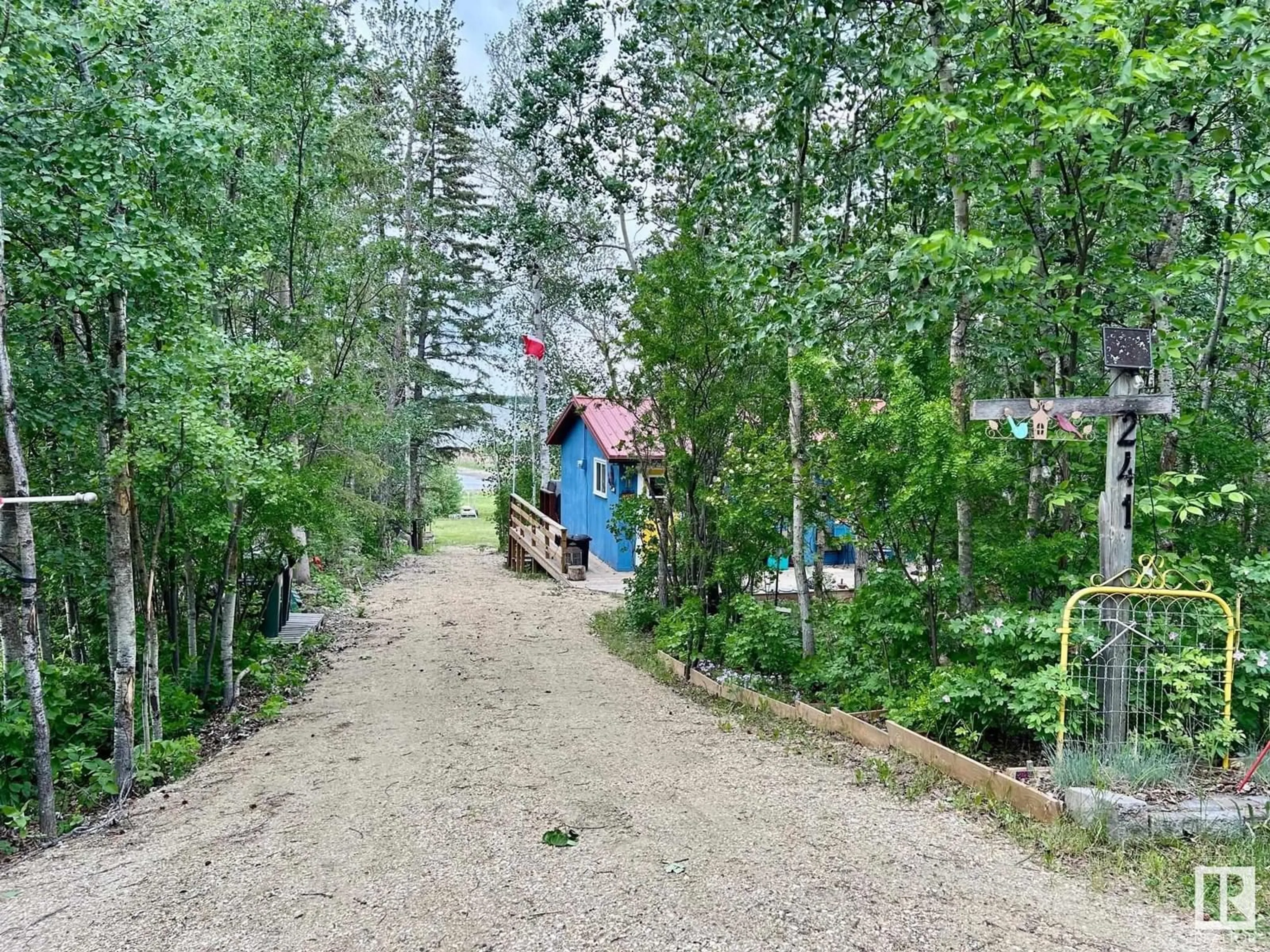 A pic from outside/outdoor area/front of a property/back of a property/a pic from drone, forest/trees view for 51268 - 241 RGE ROAD 204, Rural Strathcona County Alberta T8G1E9