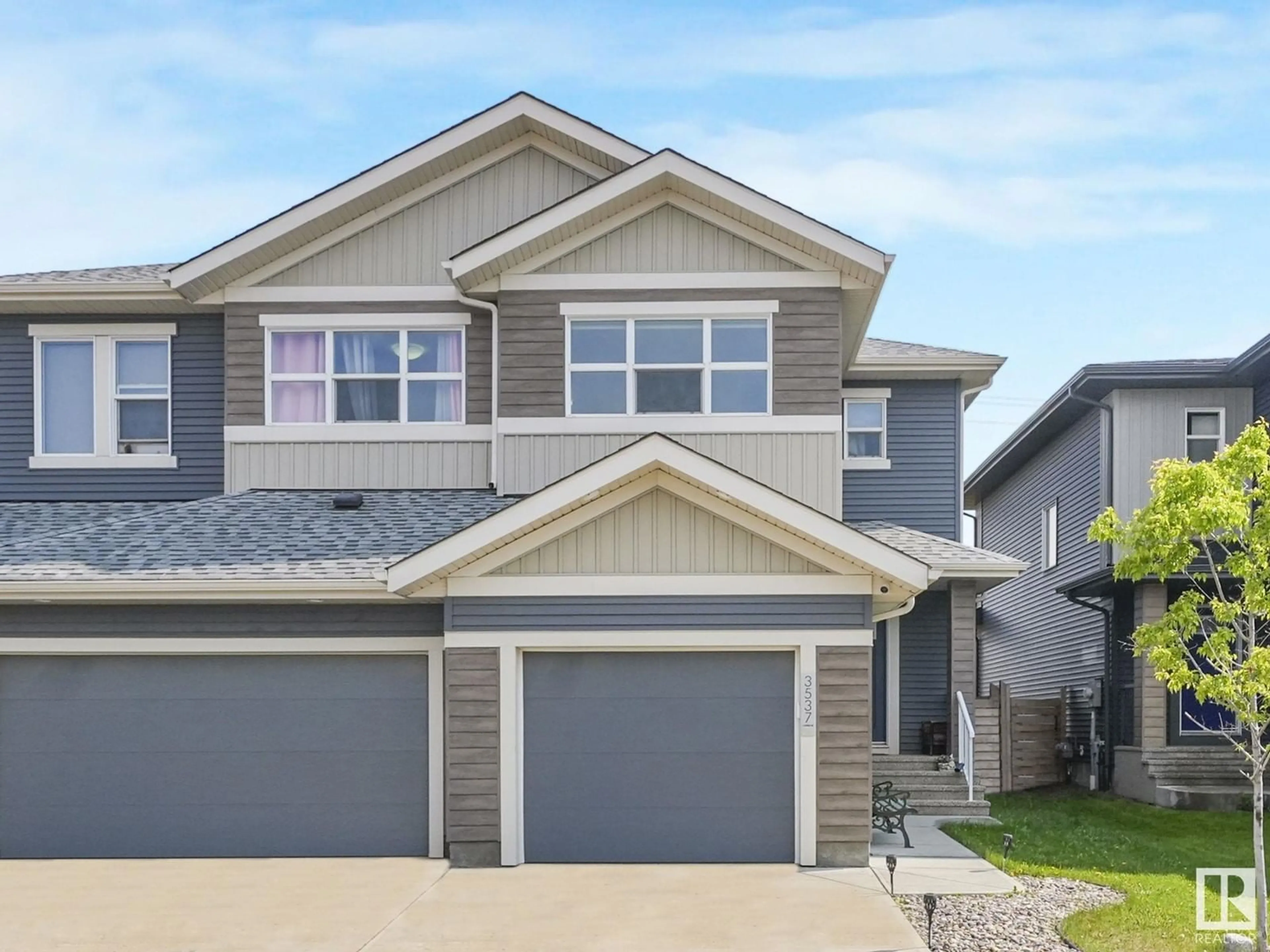 Home with vinyl exterior material, street for 3537 8 AV, Edmonton Alberta T6X2G6