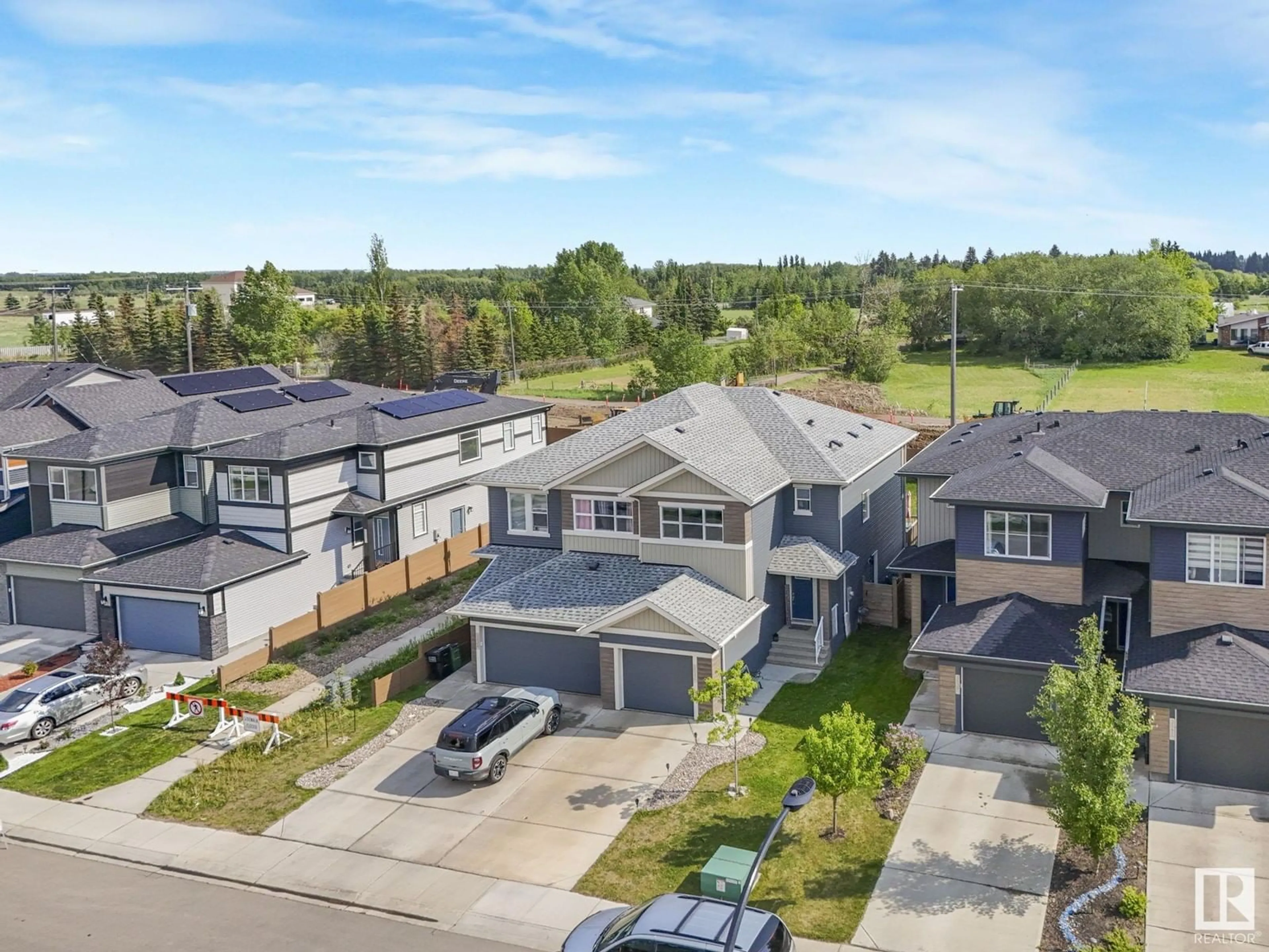 A pic from outside/outdoor area/front of a property/back of a property/a pic from drone, street for 3537 8 AV, Edmonton Alberta T6X2G6