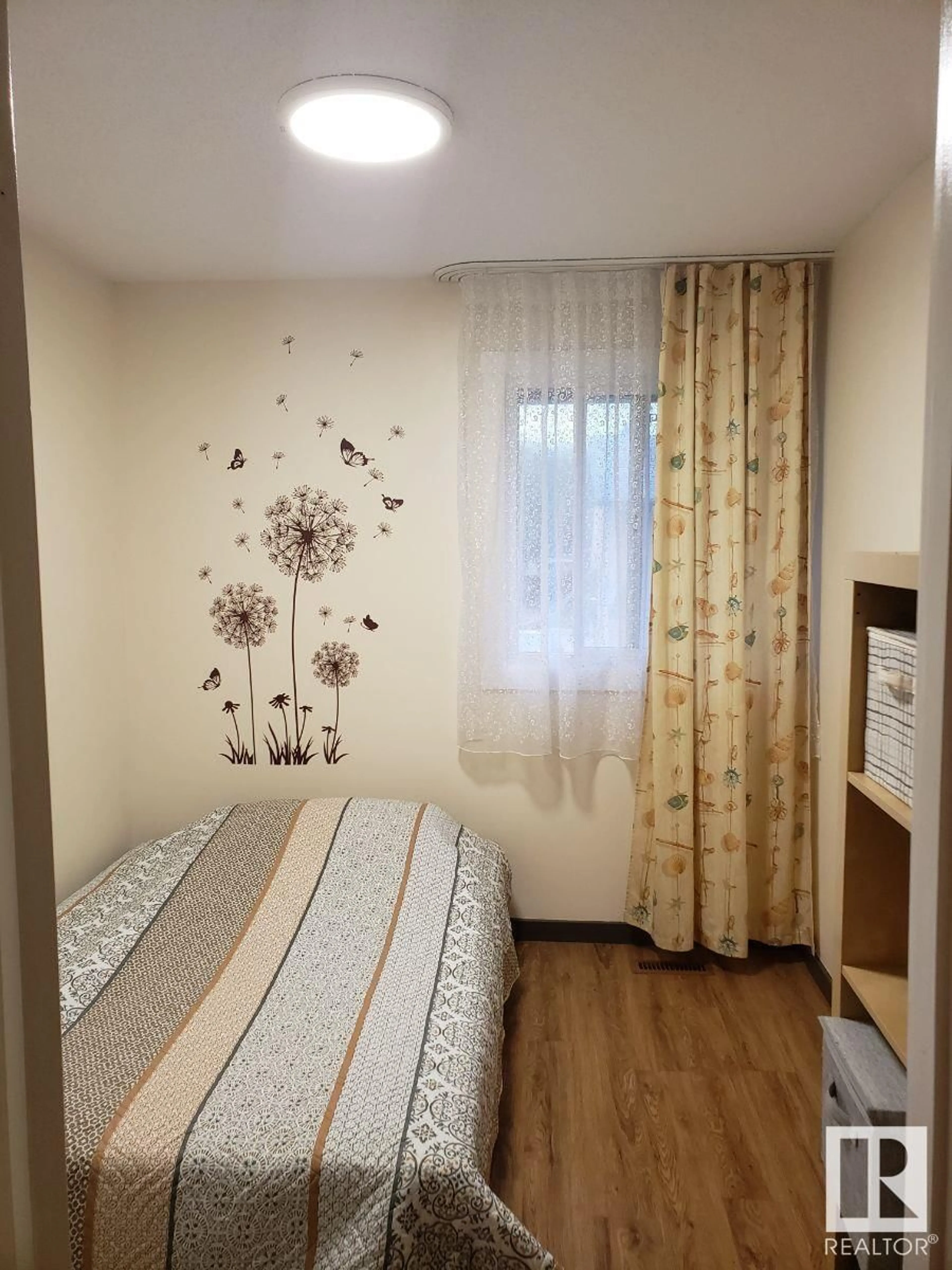 Bedroom with bed, wood/laminate floor for 144 WOODSTOCK NW, Edmonton Alberta T5T0H6