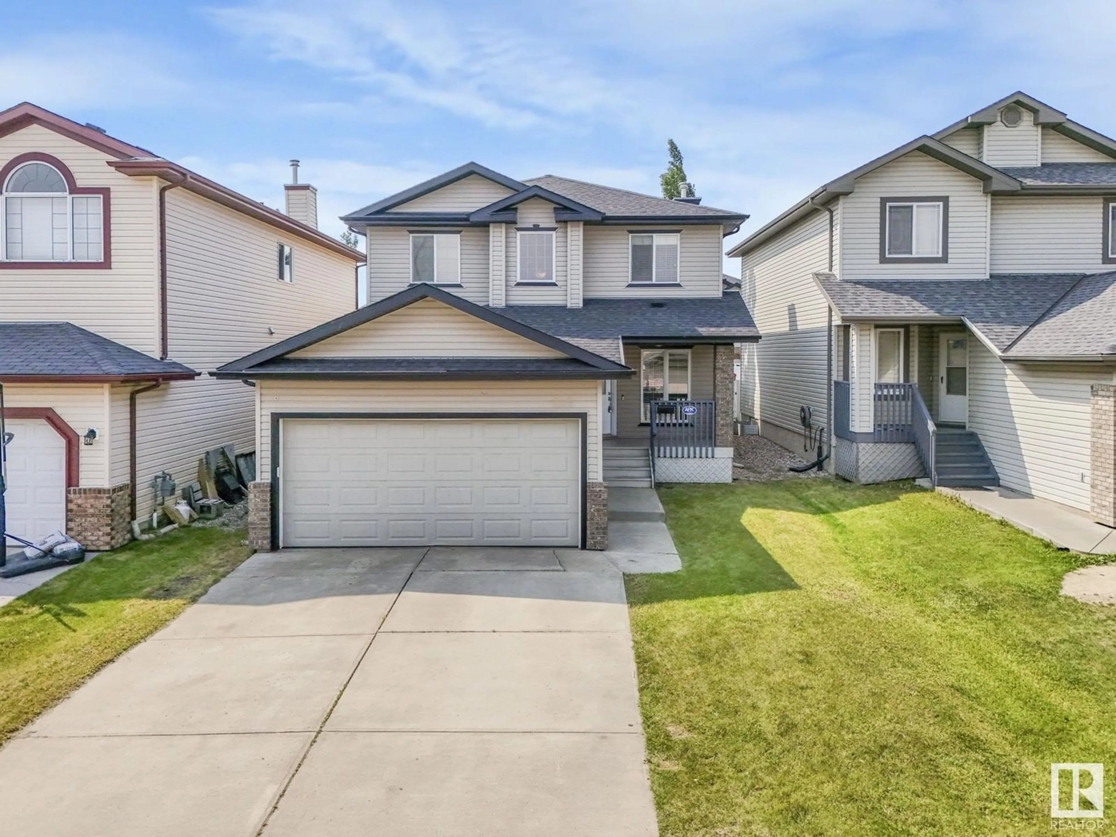 Home with vinyl exterior material, street for 4613 164 AV, Edmonton Alberta T5Y0A5