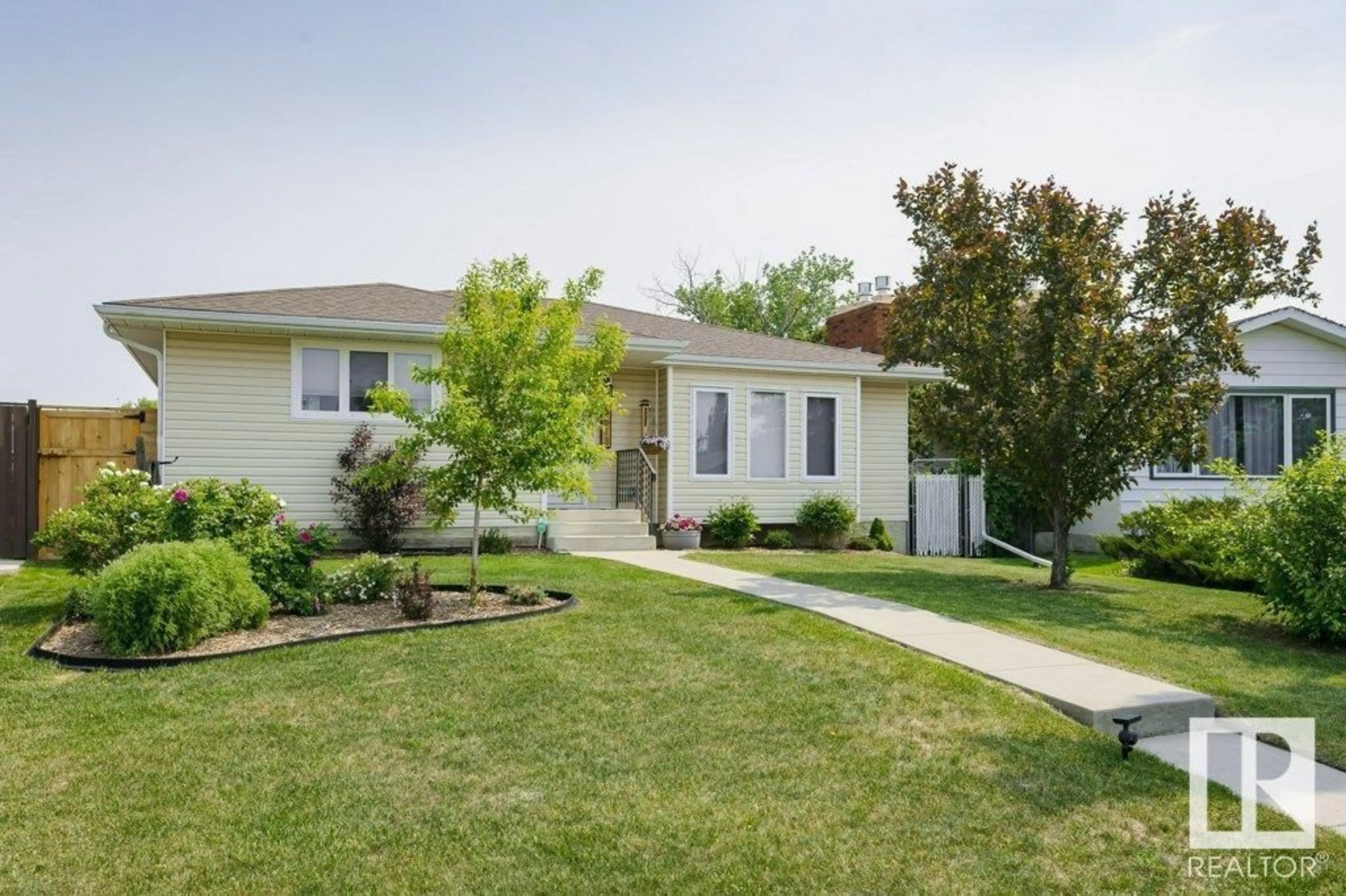 Home with vinyl exterior material, street for NW - 8613 29 AV, Edmonton Alberta T6K2X5