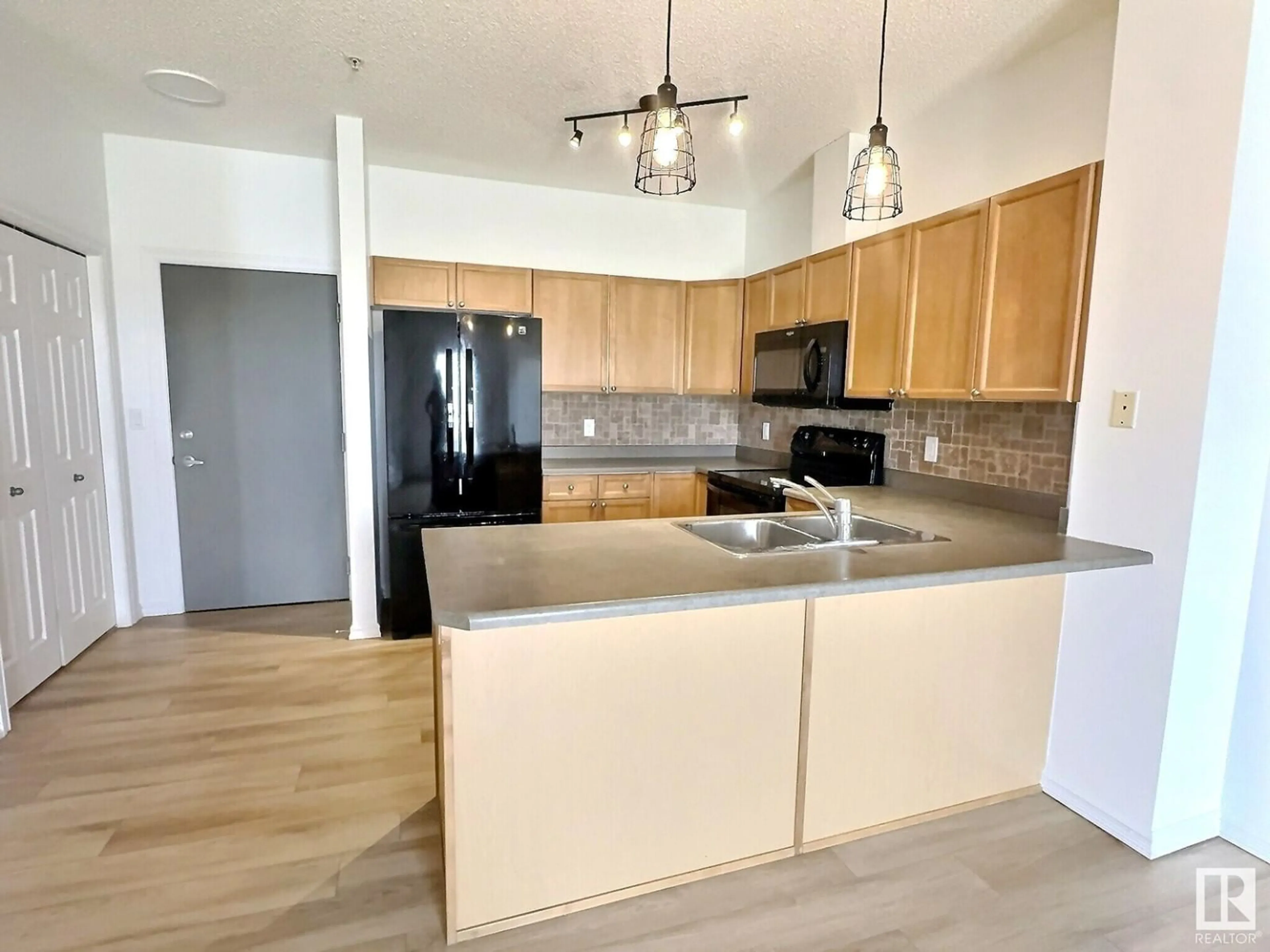 Open concept kitchen, unknown for #319 - 226 MACEWAN RD, Edmonton Alberta T6W0L5