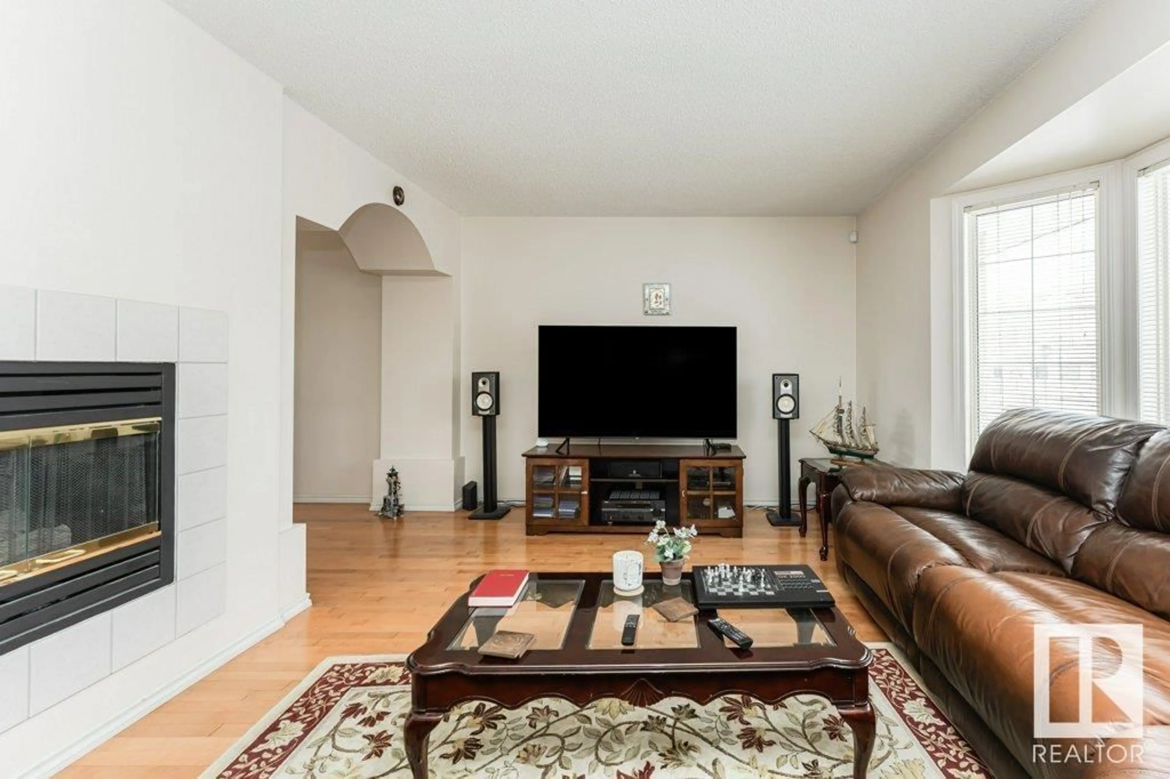 Living room with furniture, unknown for 124 11115 9 AV, Edmonton Alberta T6J6Z1