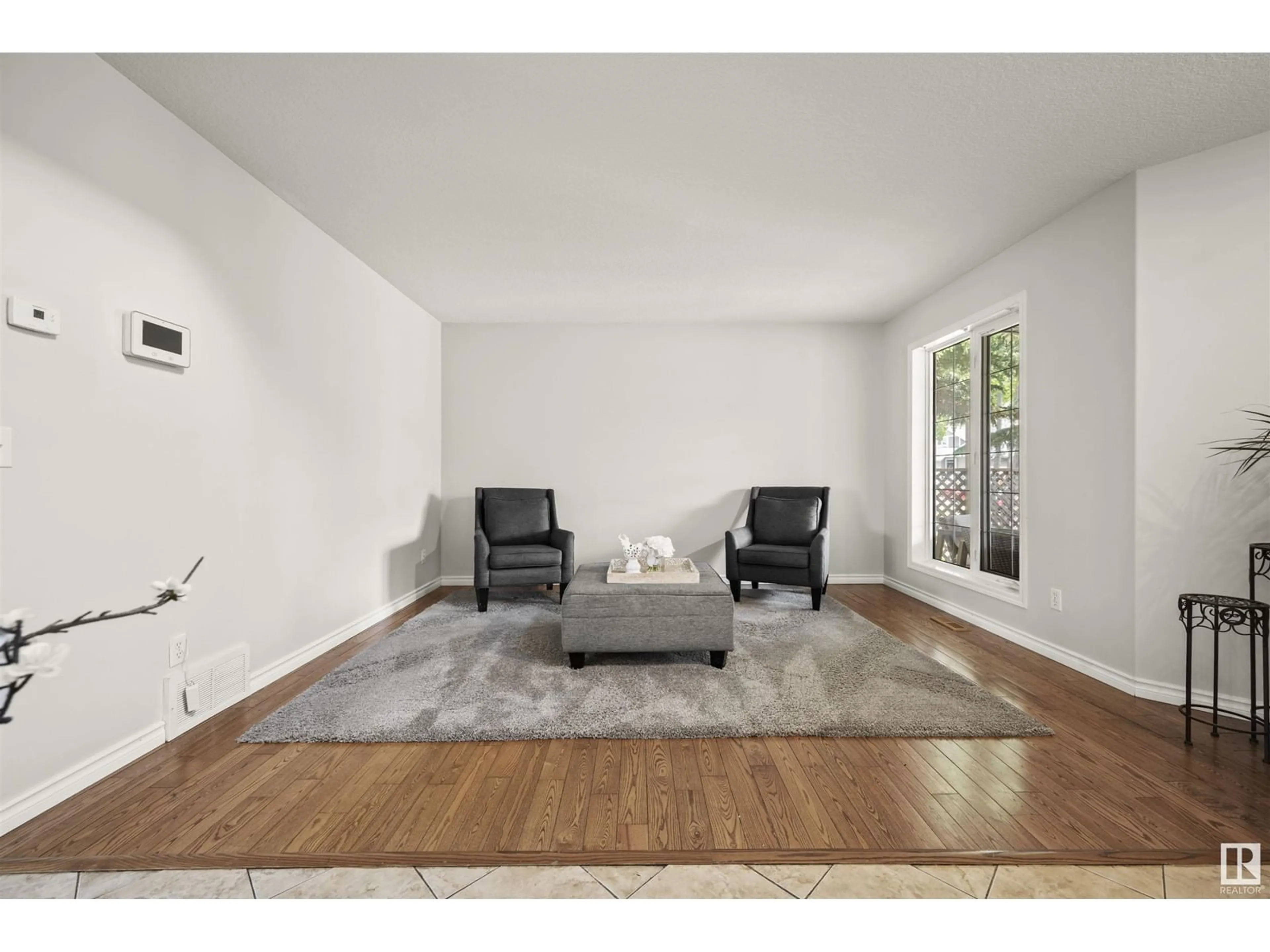 Living room with furniture, unknown for 4106 51 ST, Beaumont Alberta T4X1N6