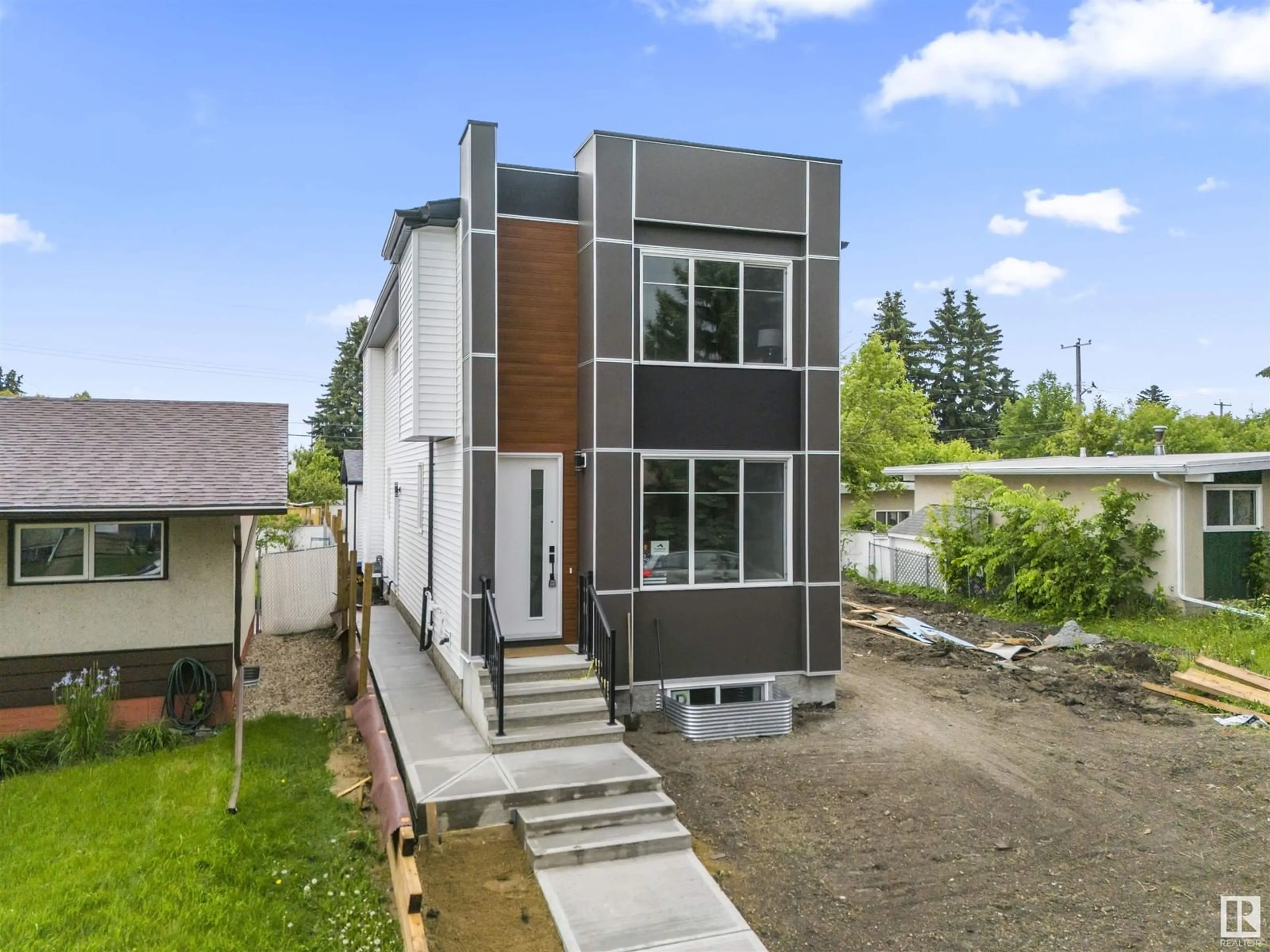 Home with vinyl exterior material, street for NW - 4725 105B ST, Edmonton Alberta T6H2R7