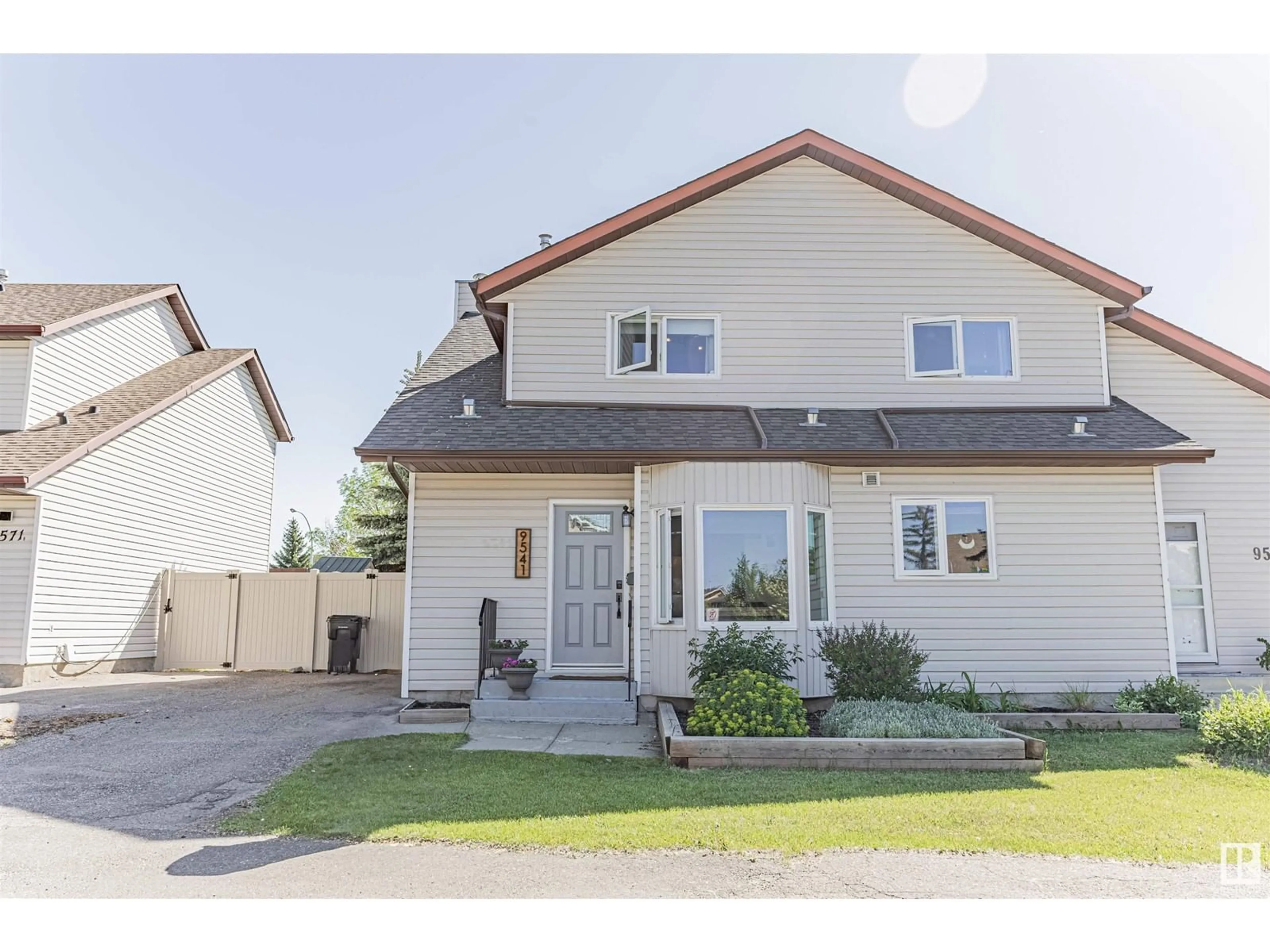 Home with vinyl exterior material, street for NW - 9541 180A ST, Edmonton Alberta T5T2Z4