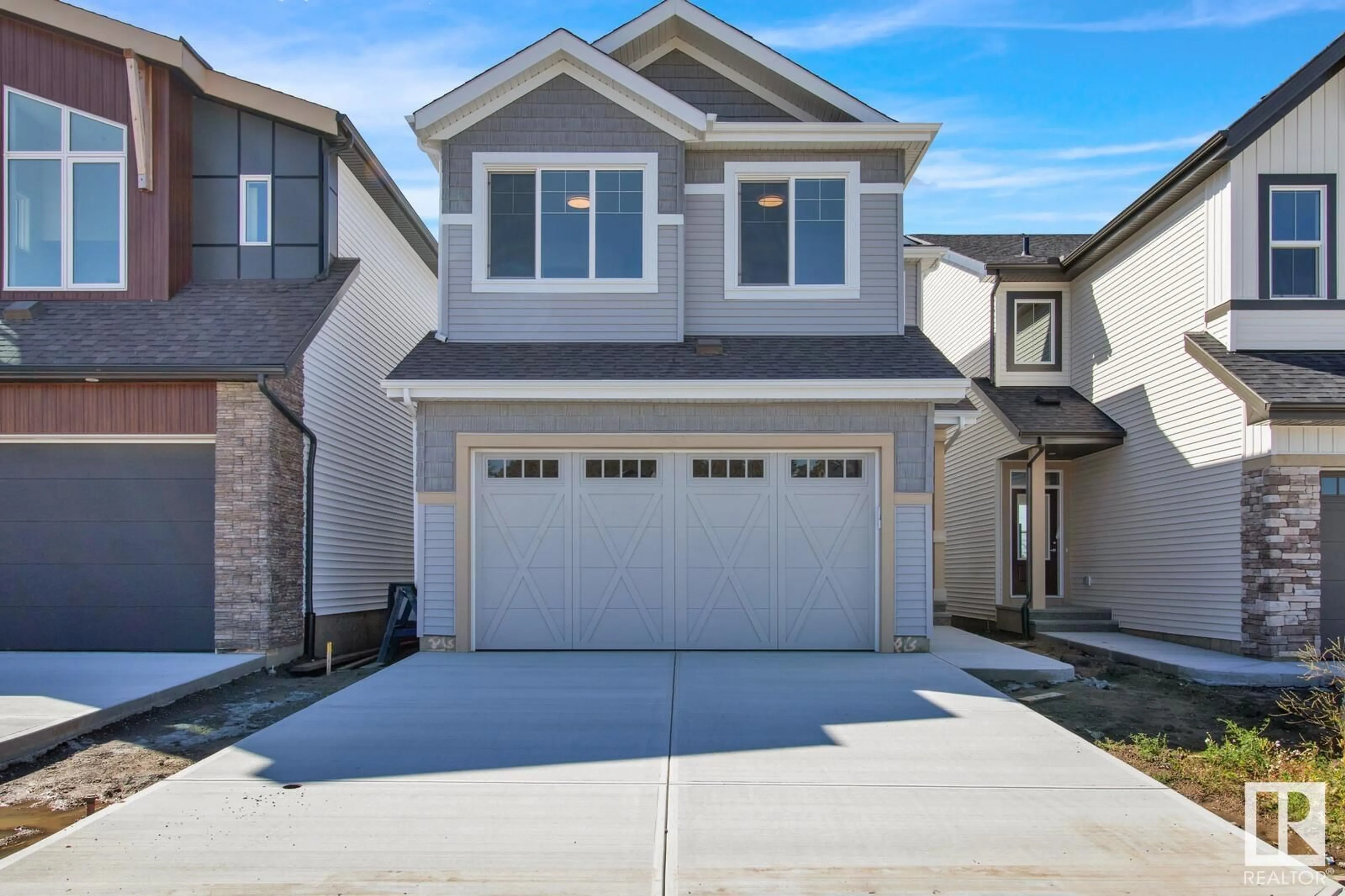 Home with vinyl exterior material, street for 6007 EDMONDS PL, Edmonton Alberta T6M1S1