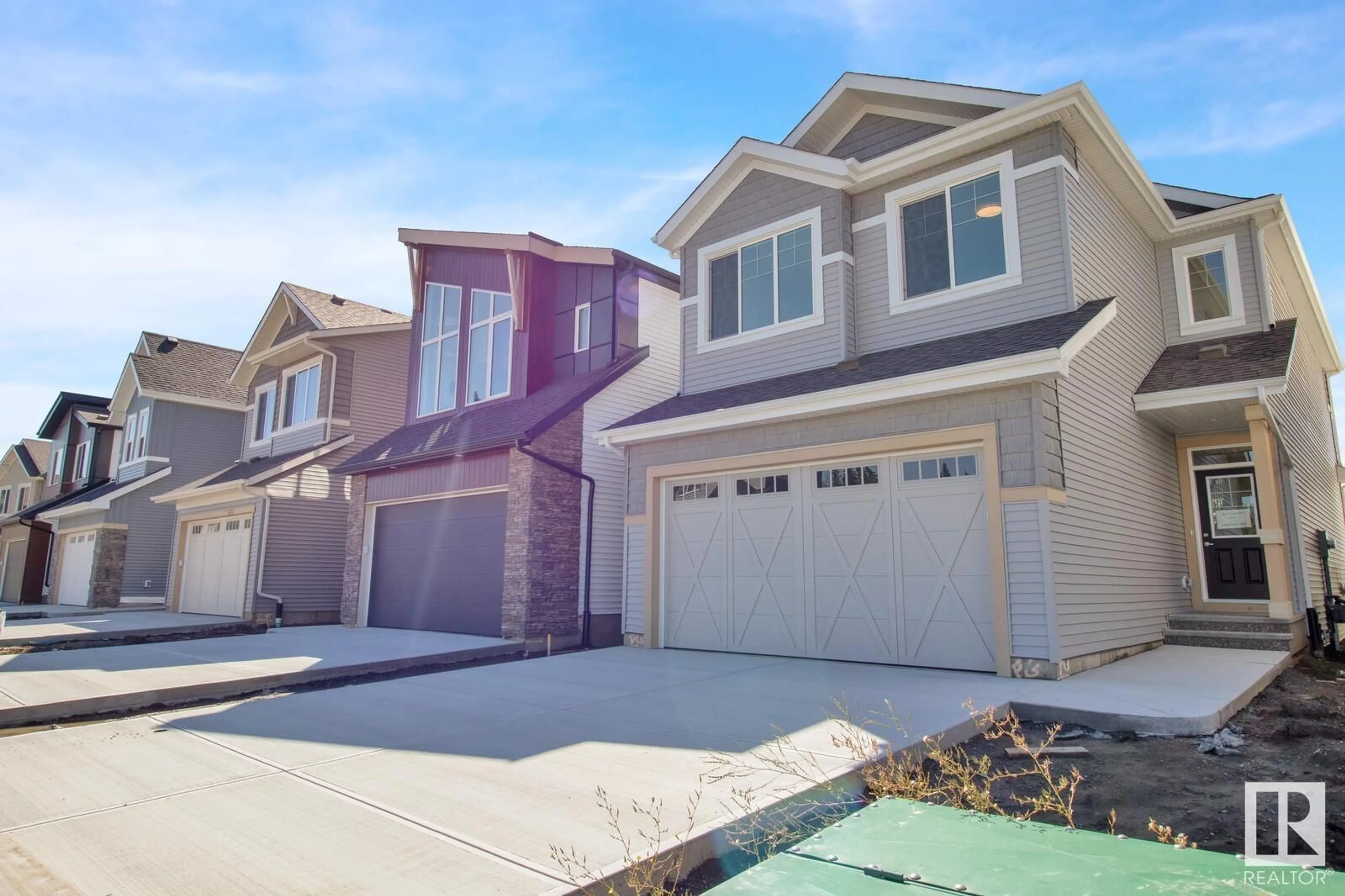 Home with vinyl exterior material, street for 6007 EDMONDS PL, Edmonton Alberta T6M1S1