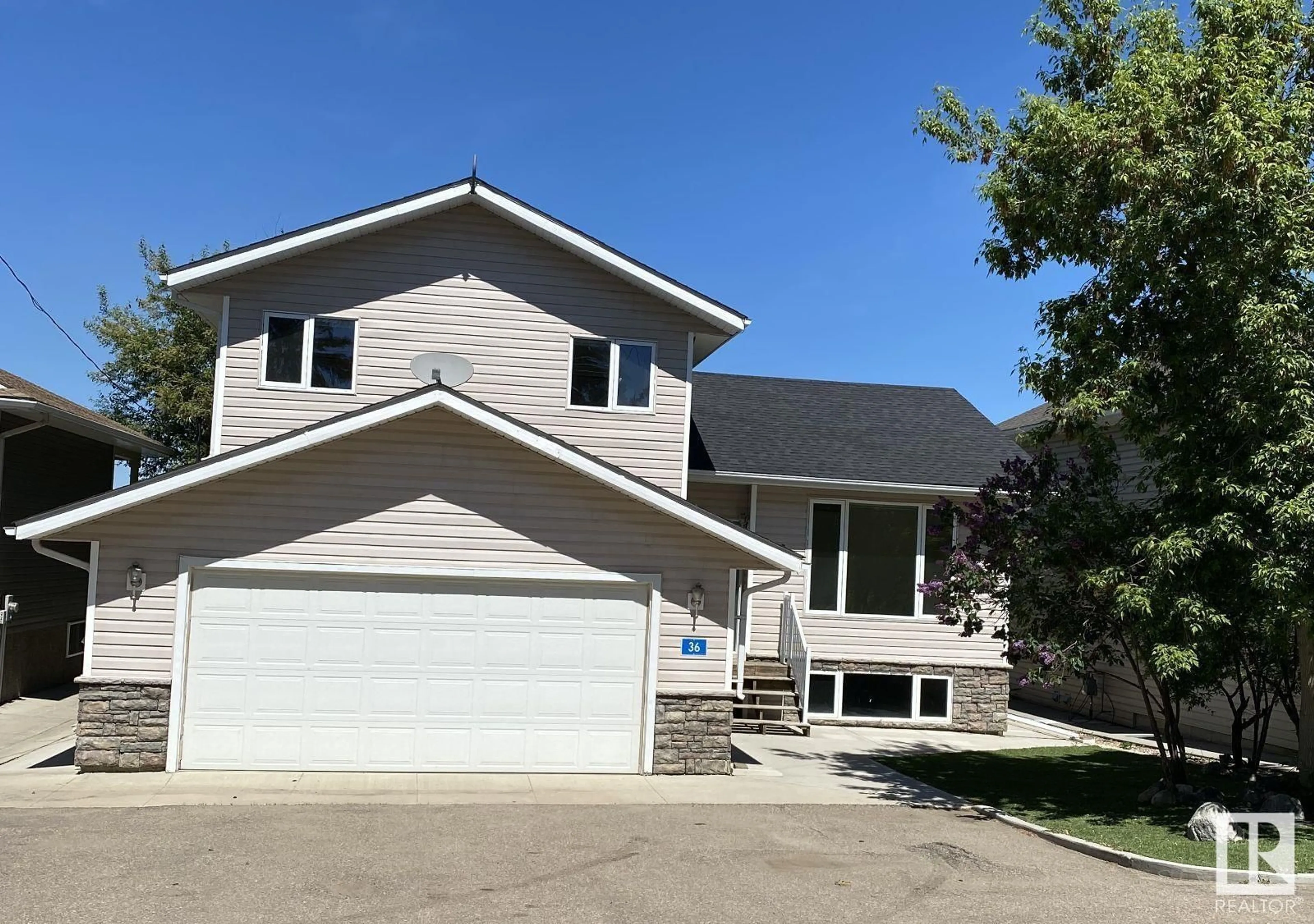 Home with vinyl exterior material, street for 46302 - 36 TOWNSHIP RD 611, Rural Bonnyville M.D. Alberta T0A1H0