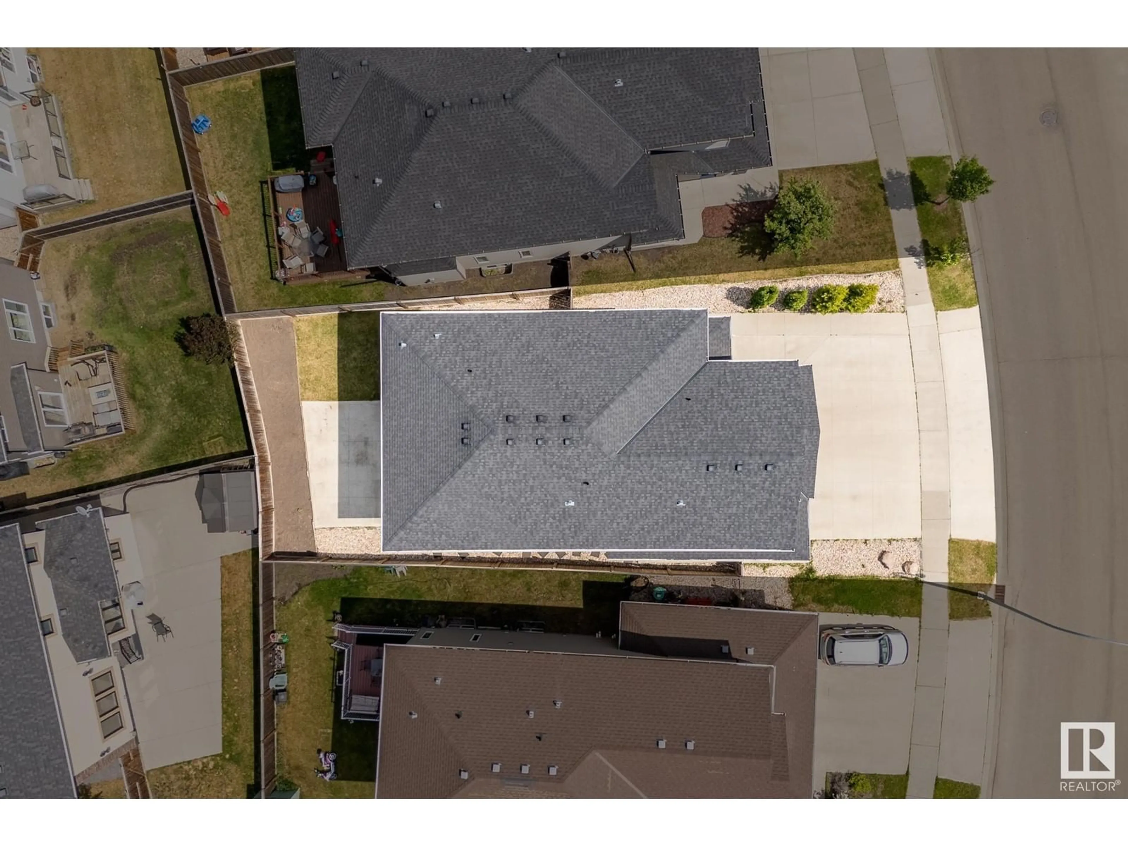 A pic from outside/outdoor area/front of a property/back of a property/a pic from drone, street for 6112 55 AV, Beaumont Alberta T4X0H3