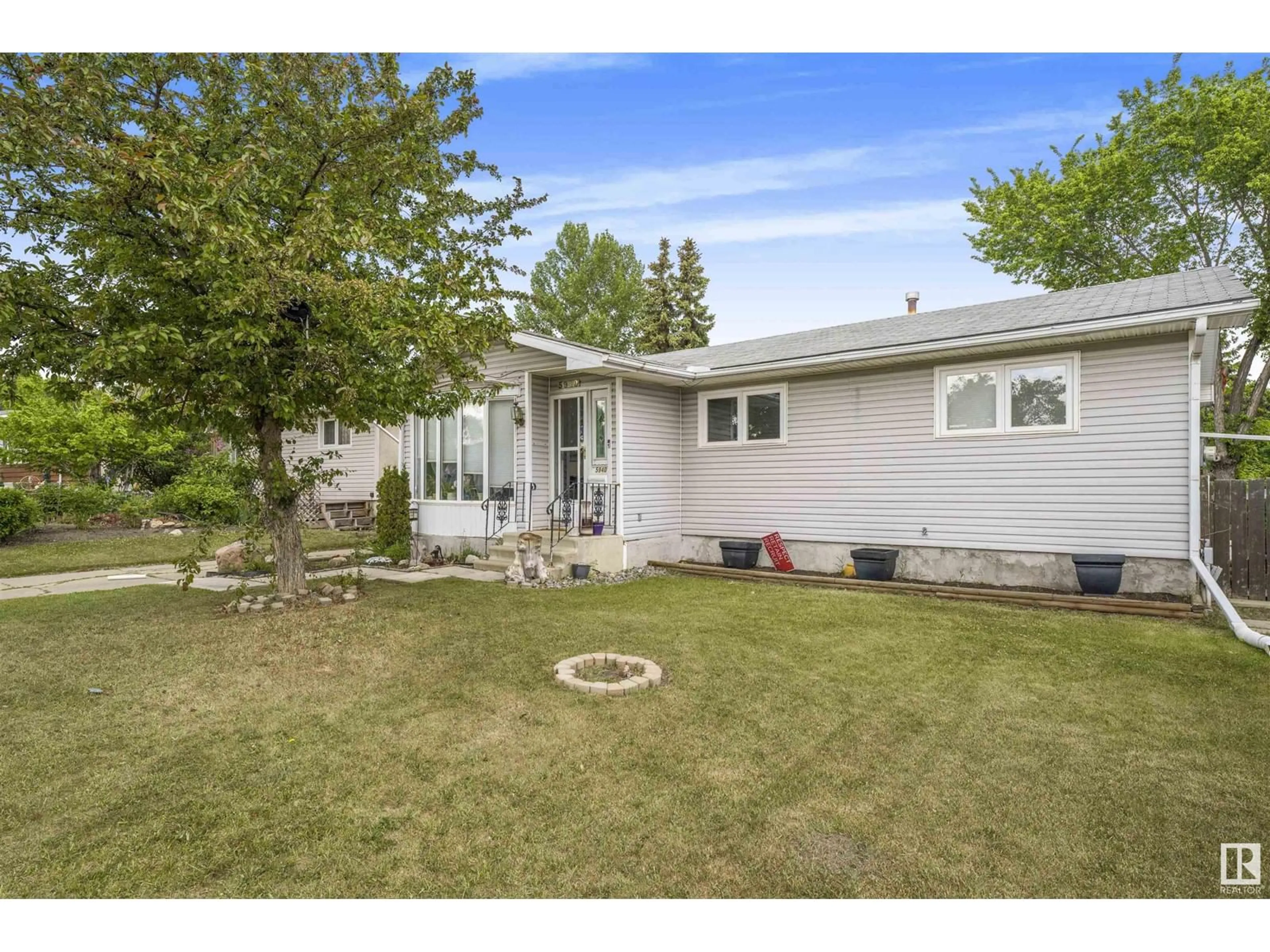 A pic from outside/outdoor area/front of a property/back of a property/a pic from drone, street for 5940 149 AV, Edmonton Alberta T5A1V6