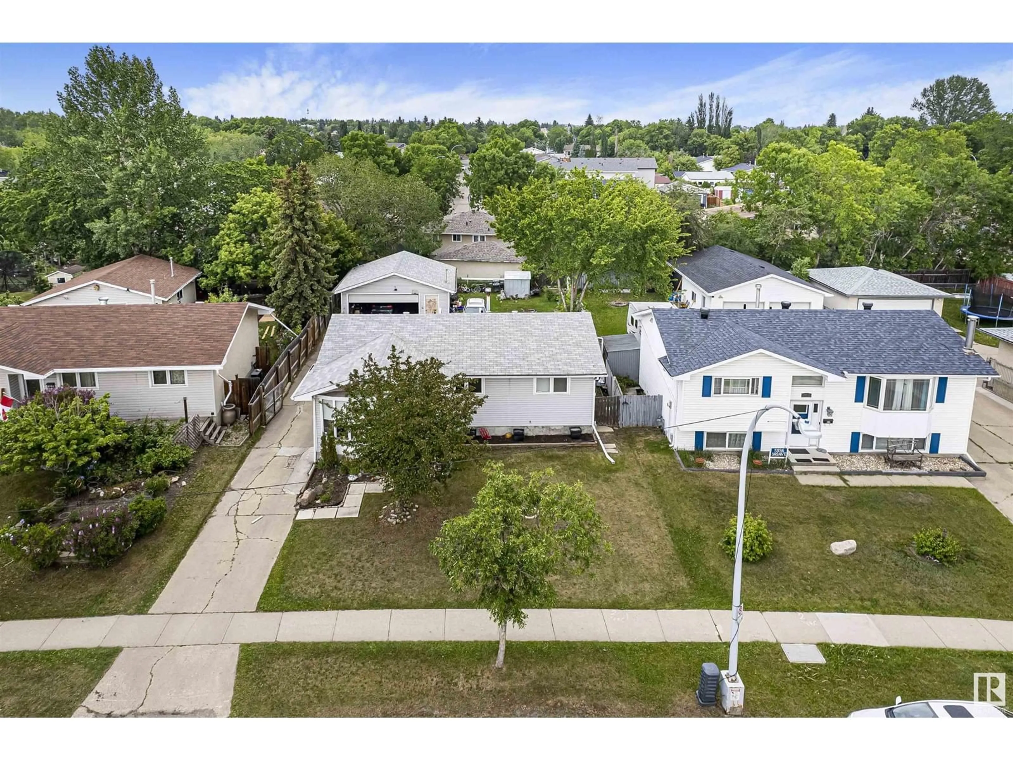 A pic from outside/outdoor area/front of a property/back of a property/a pic from drone, street for 5940 149 AV, Edmonton Alberta T5A1V6
