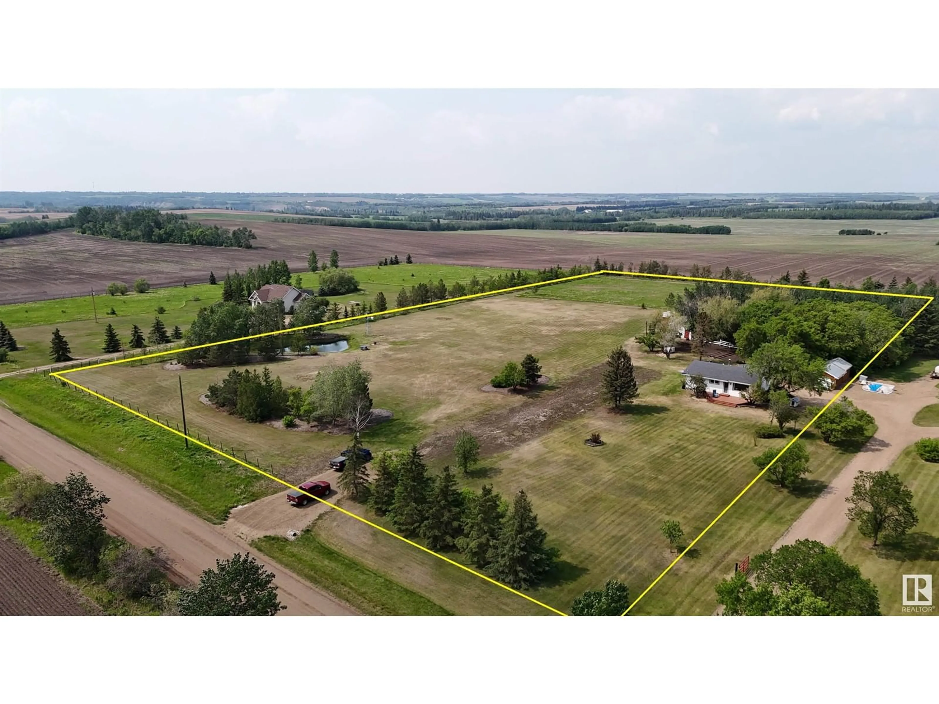 A pic from outside/outdoor area/front of a property/back of a property/a pic from drone, unknown for 23222 TWP RD 560, Gibbons Alberta T0A1N0