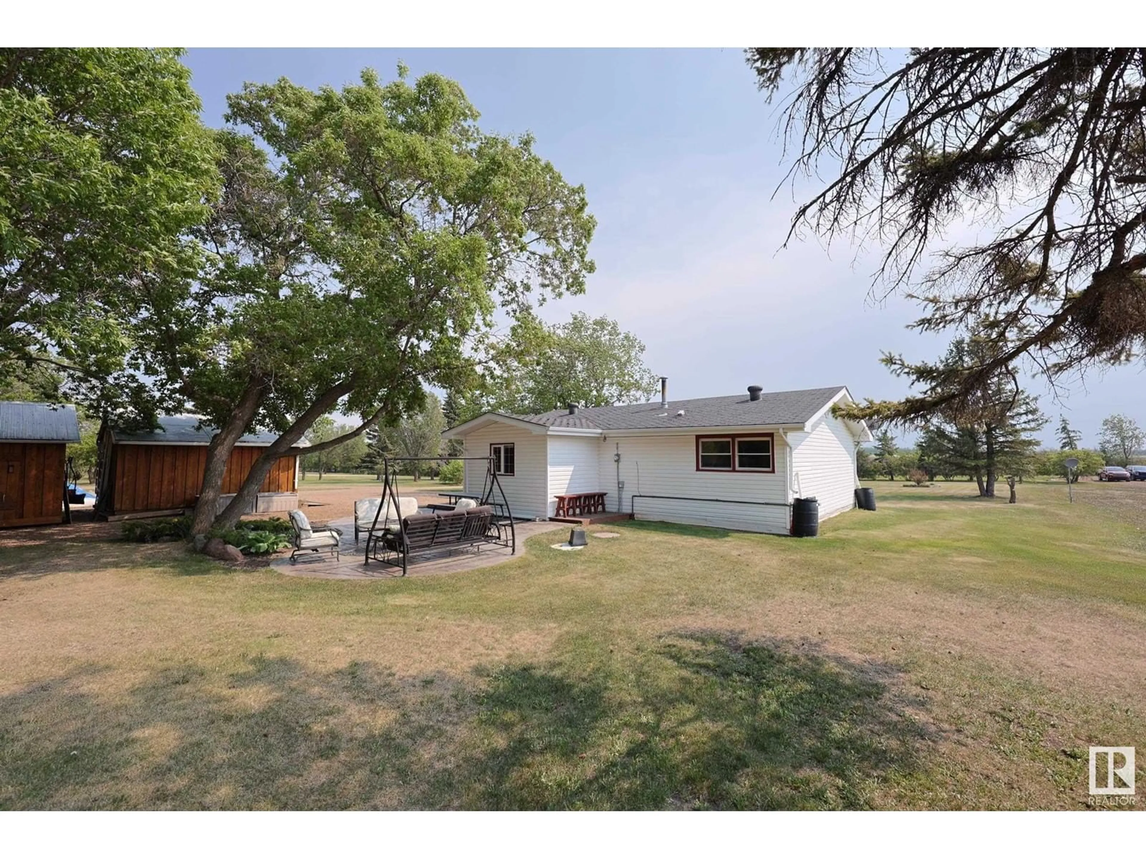 A pic from outside/outdoor area/front of a property/back of a property/a pic from drone, unknown for 23222 TWP RD 560, Gibbons Alberta T0A1N0