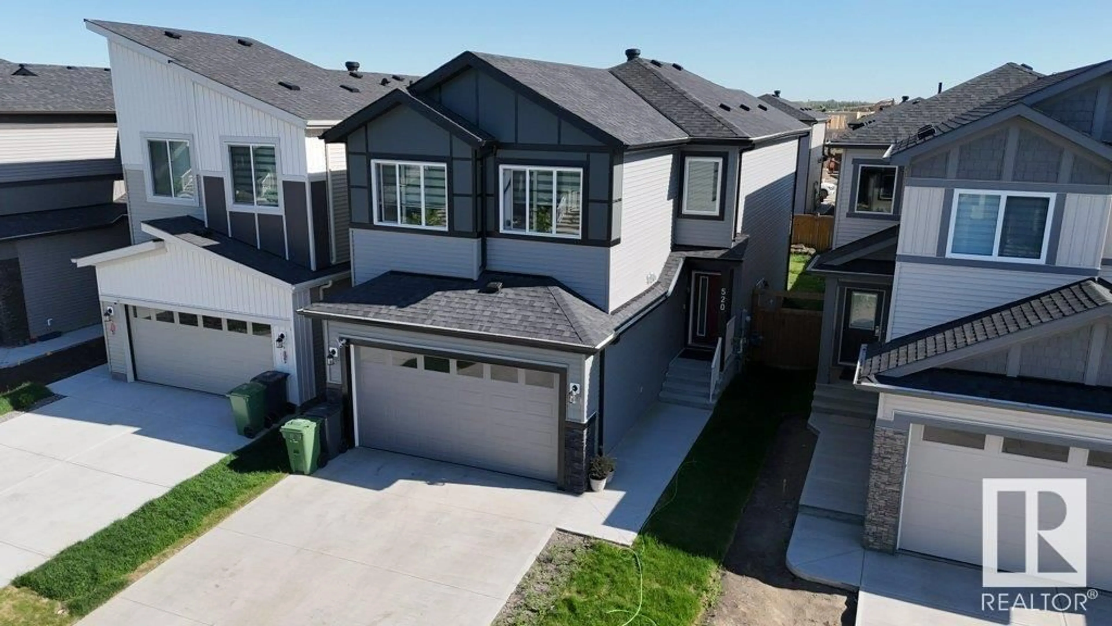 A pic from outside/outdoor area/front of a property/back of a property/a pic from drone, street for 520 BLUFF LN, Leduc Alberta T9E1R5