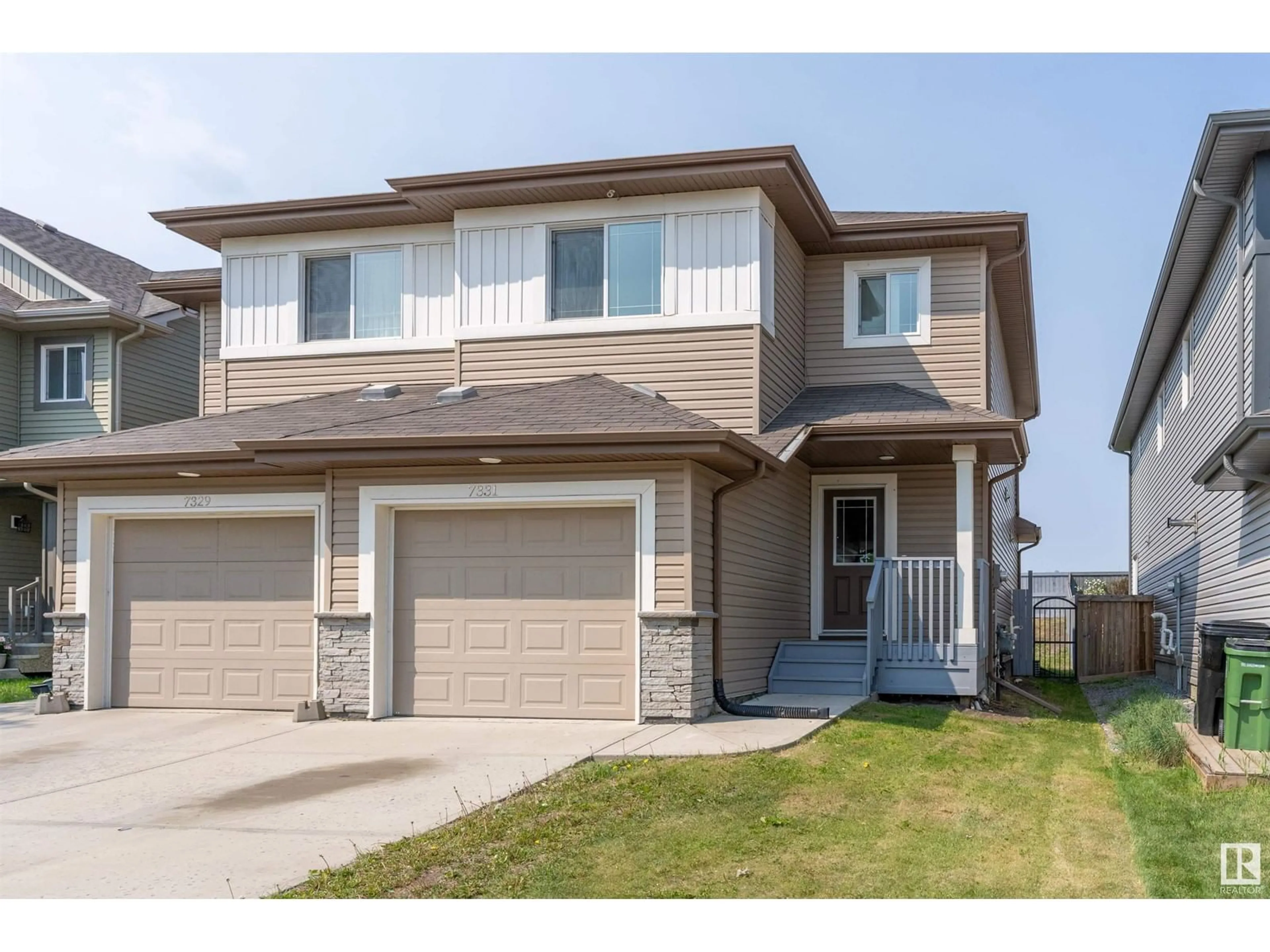 Home with vinyl exterior material, street for 7331 ARMOUR CR, Edmonton Alberta T6W2S2