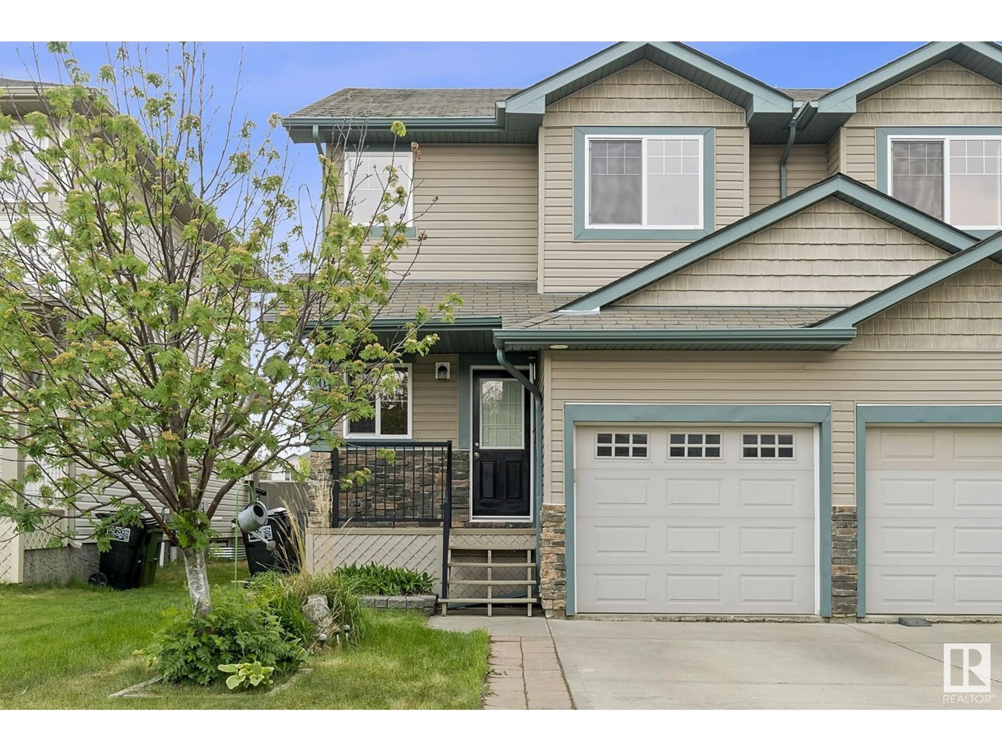Home with vinyl exterior material, street for SW - 5907 8 AV, Edmonton Alberta T6X0G5