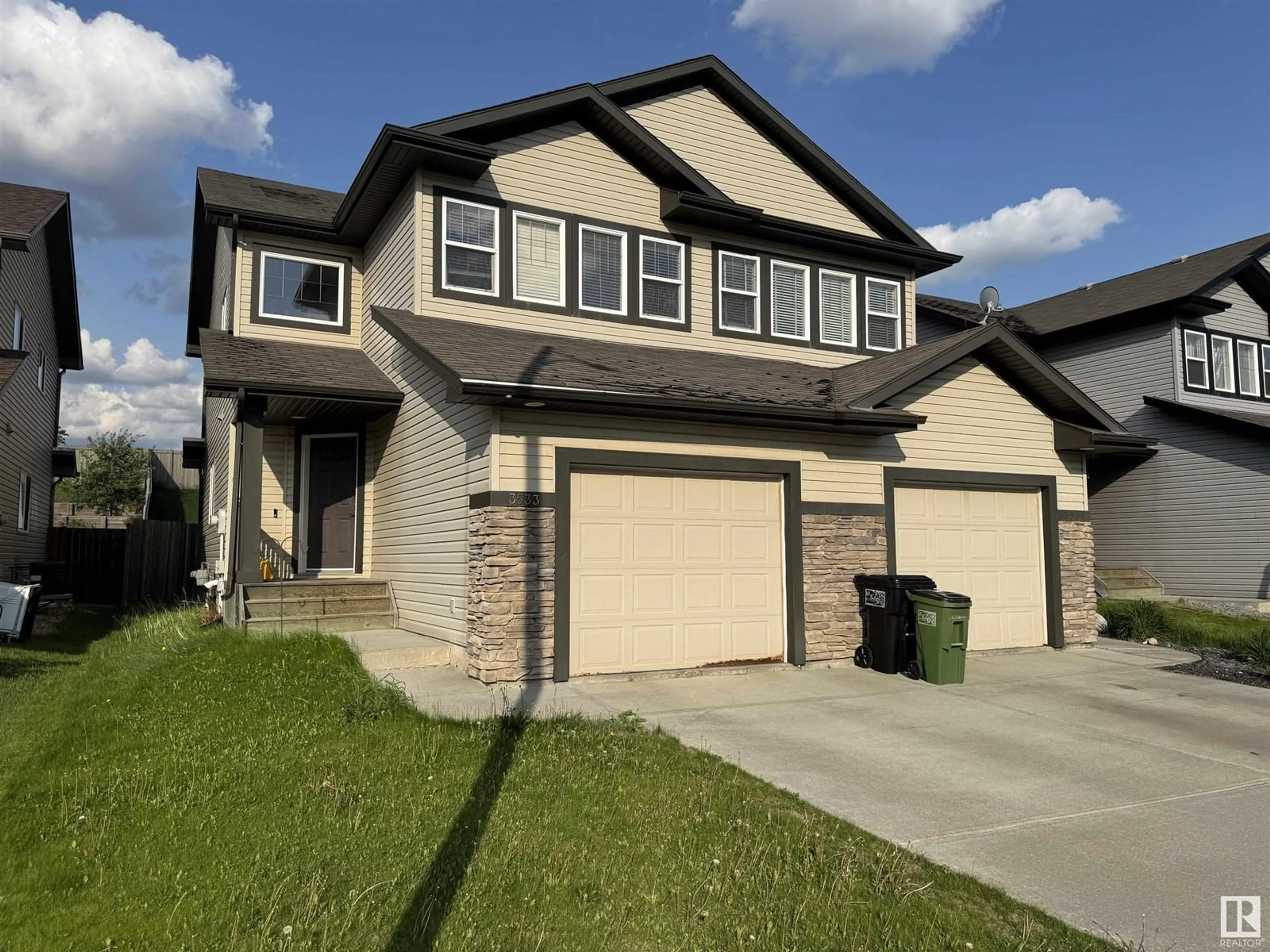 Home with vinyl exterior material, street for 3533 11 ST, Edmonton Alberta T6T0J7