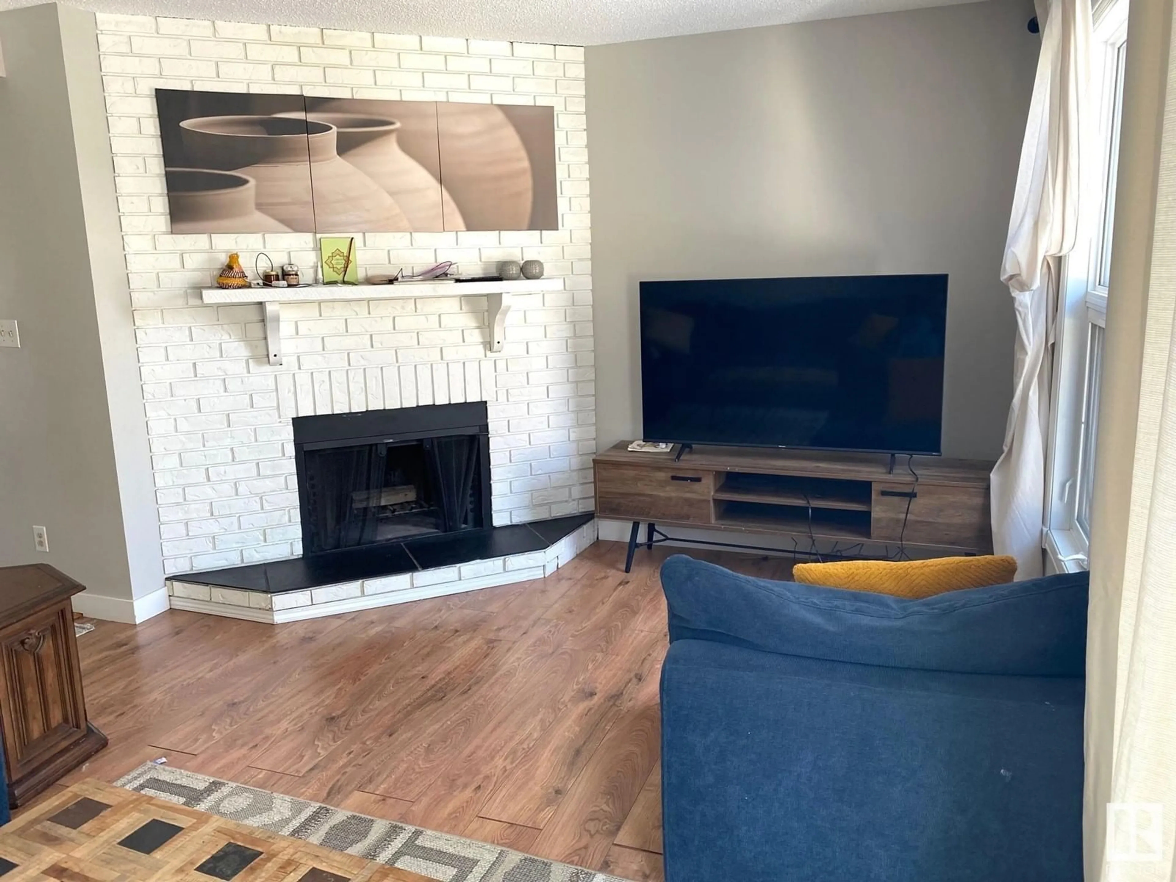Living room with furniture, unknown for 10480 28A AV, Edmonton Alberta T6J4J6