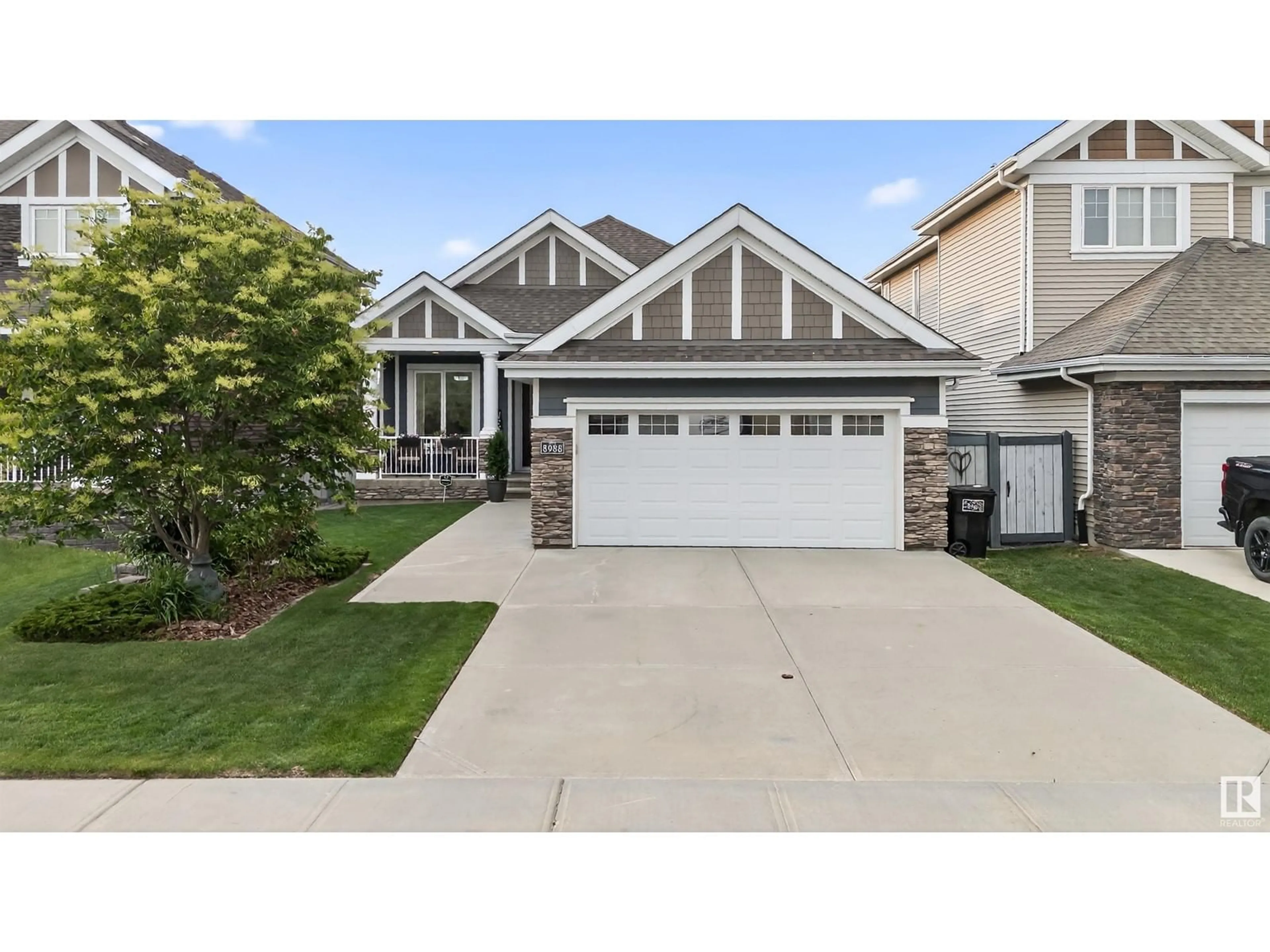 Home with vinyl exterior material, street for 8988 24 AV, Edmonton Alberta T6X1A6