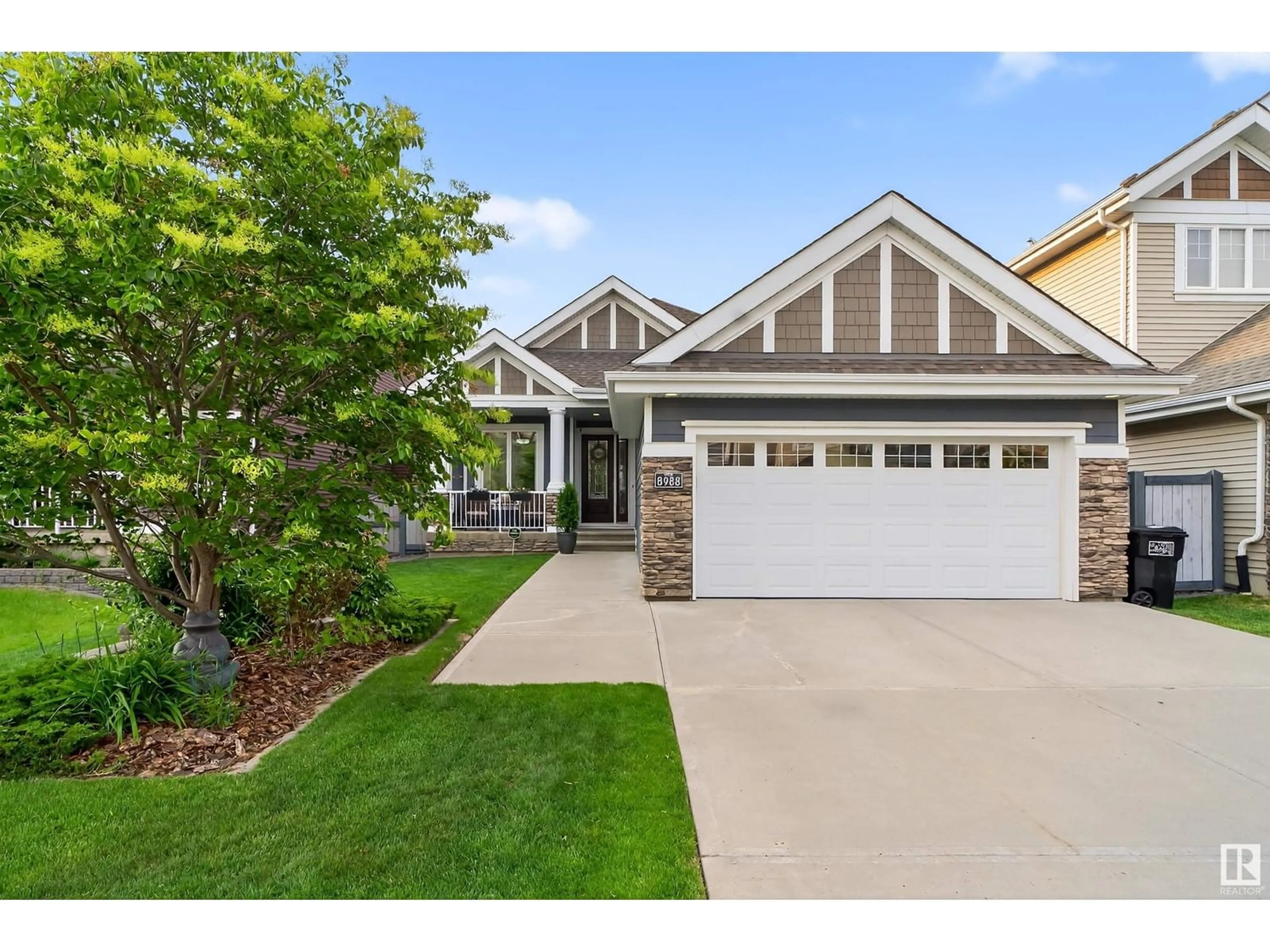 Home with vinyl exterior material, street for 8988 24 AV, Edmonton Alberta T6X1A6