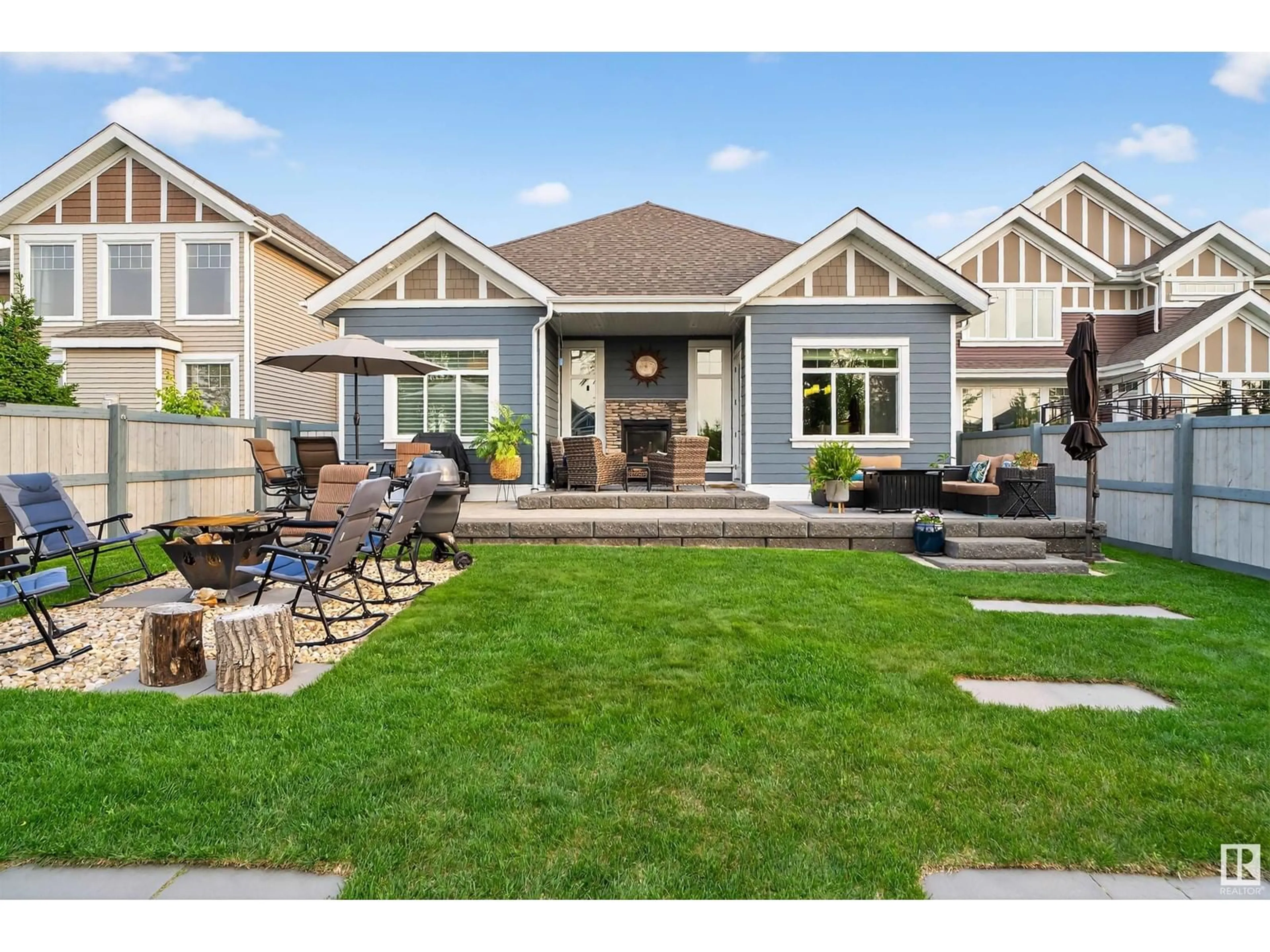 Home with vinyl exterior material, street for 8988 24 AV, Edmonton Alberta T6X1A6