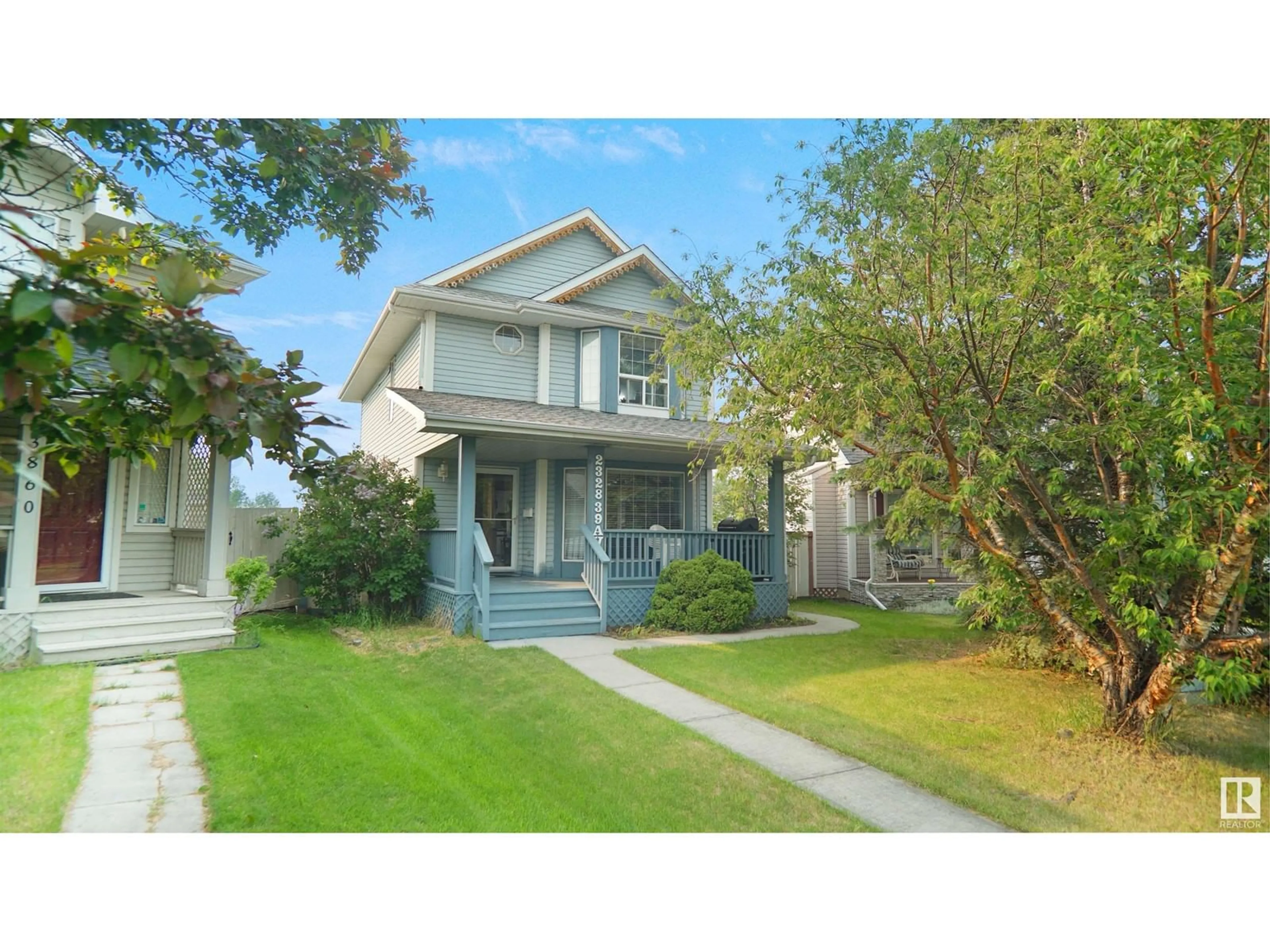 Home with vinyl exterior material, street for 2328 39 AV, Edmonton Alberta T6T1K6