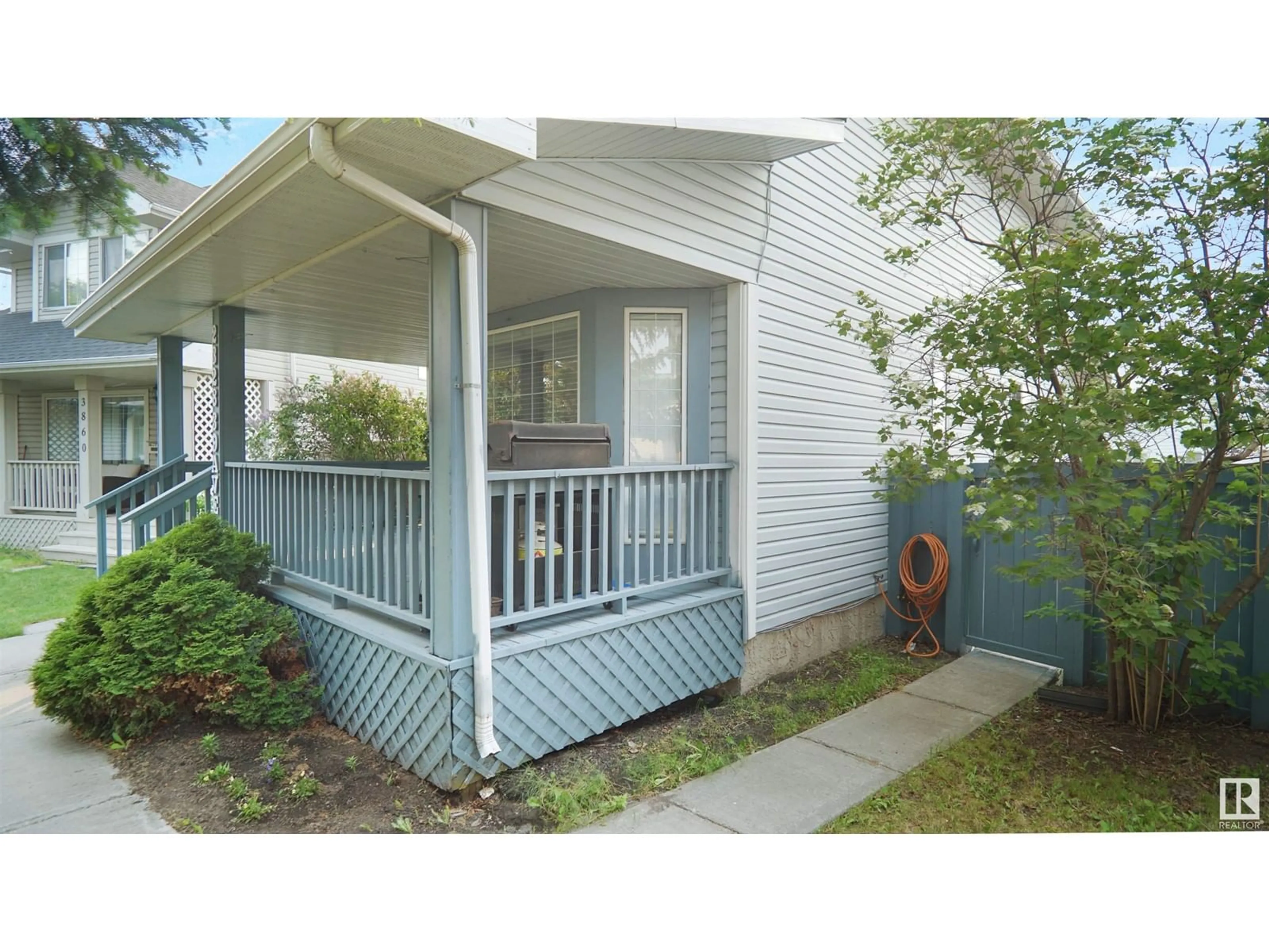 Home with vinyl exterior material, street for 2328 39 AV, Edmonton Alberta T6T1K6