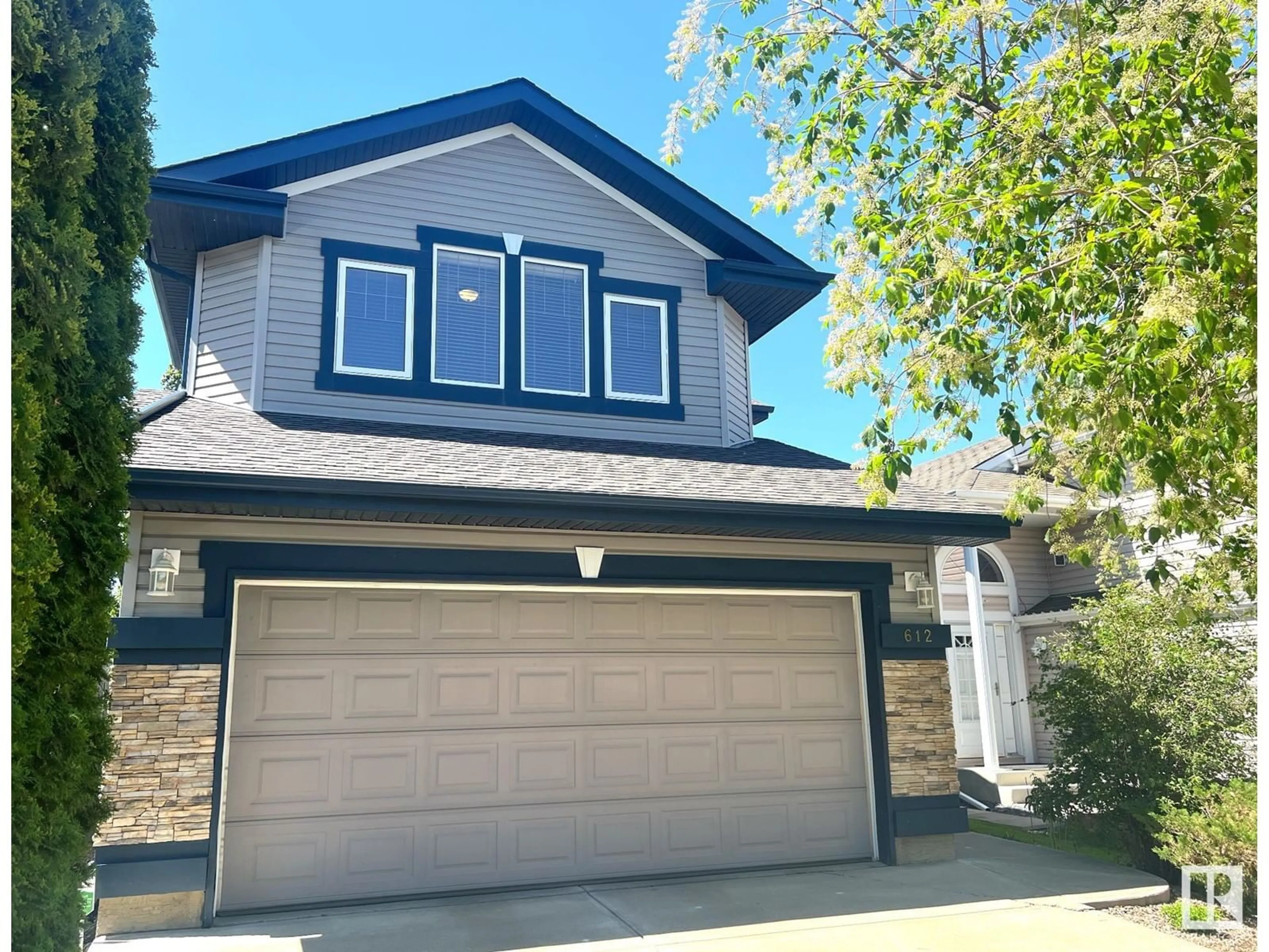 Home with vinyl exterior material, street for 612 60 ST, Edmonton Alberta T6X0G4