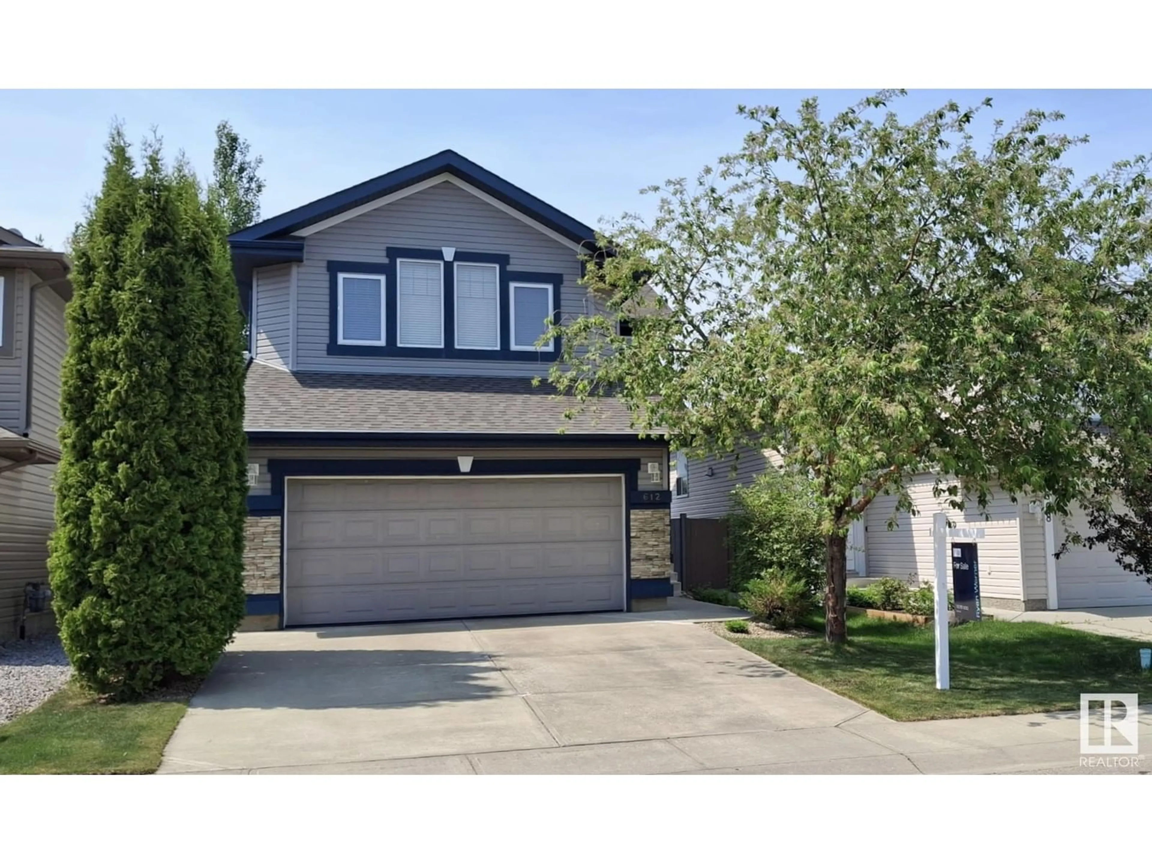 Home with vinyl exterior material, street for 612 60 ST, Edmonton Alberta T6X0G4