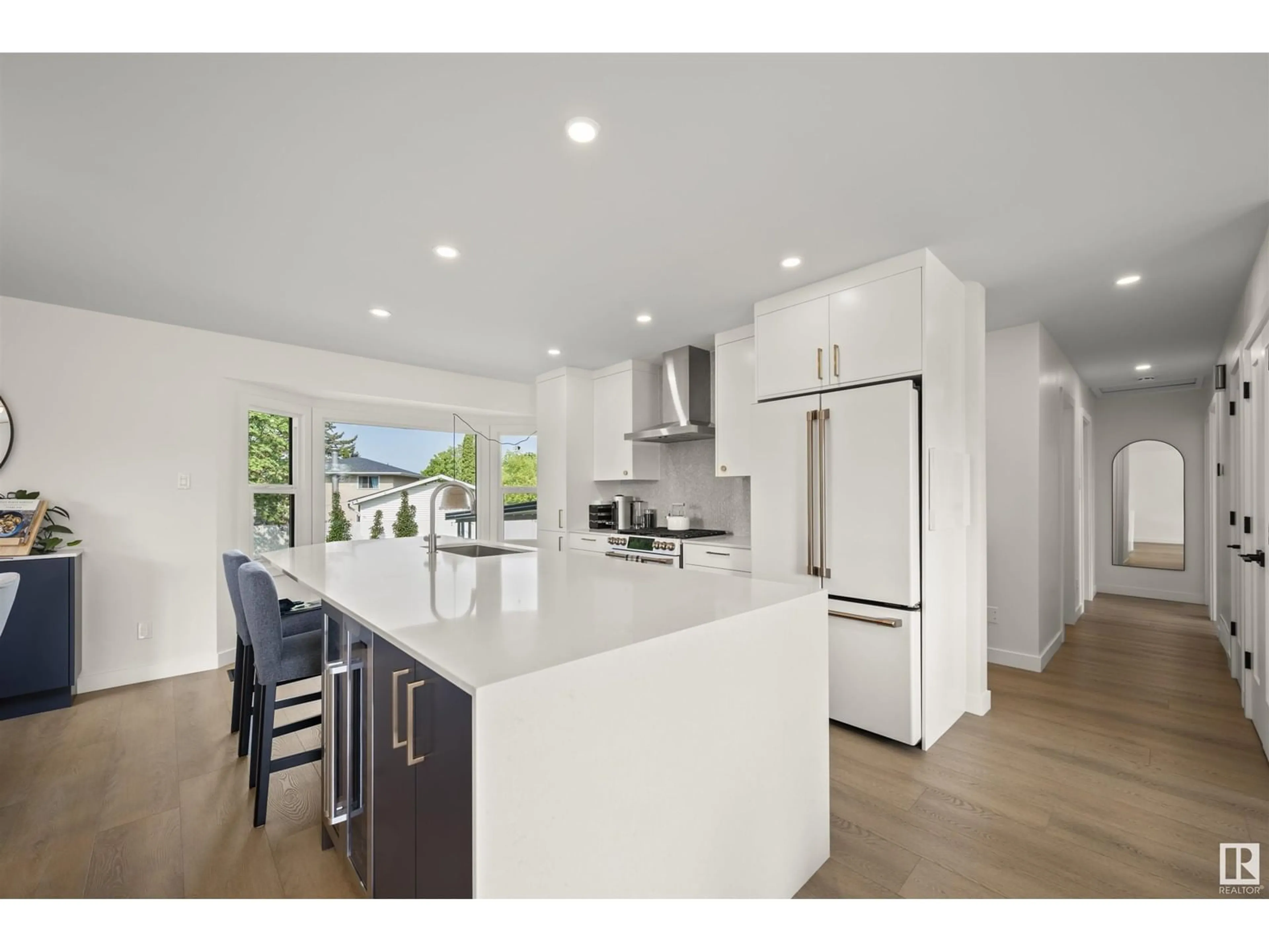 Open concept kitchen, wood/laminate floor for NW - 3524 104A ST, Edmonton Alberta T6J2N2