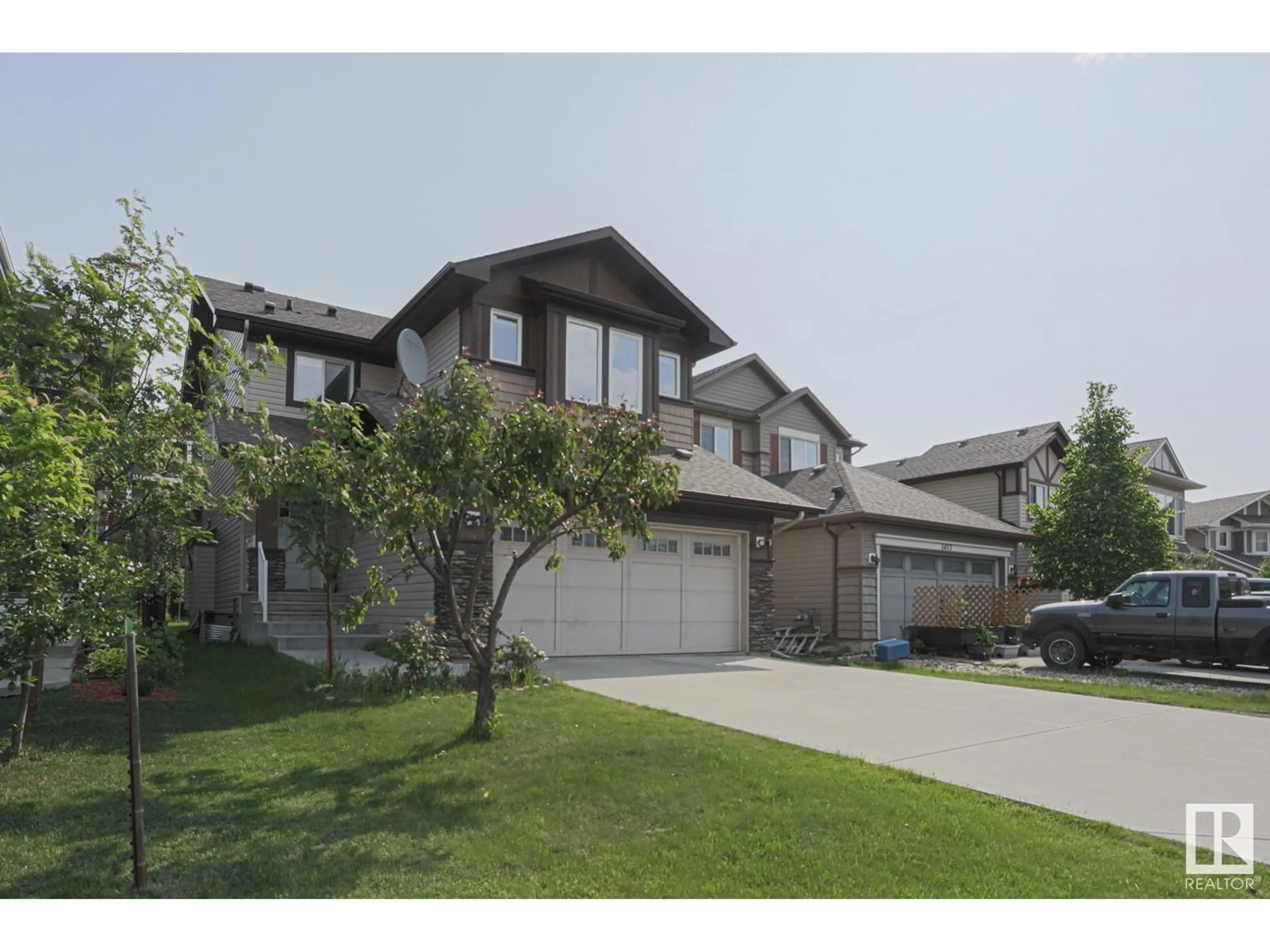 A pic from outside/outdoor area/front of a property/back of a property/a pic from drone, street for SW - 1411 CAREY WY, Edmonton Alberta T6W0Y8