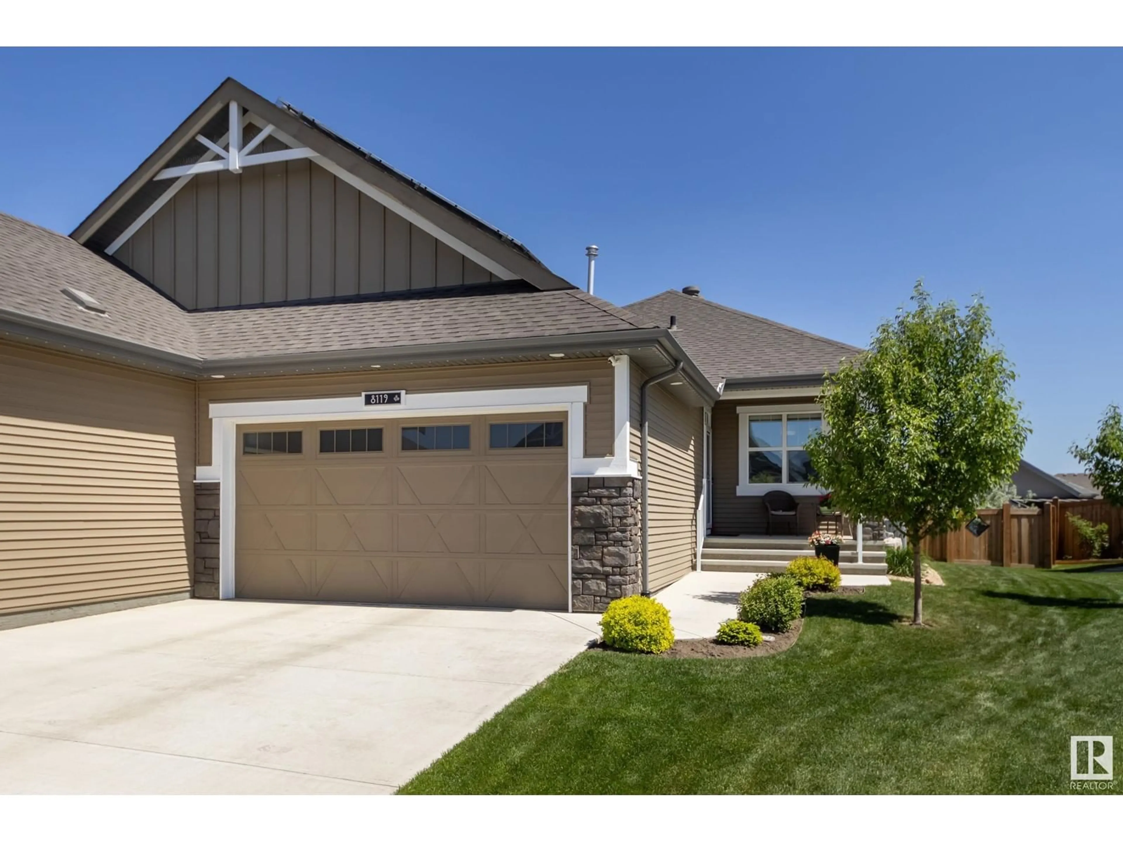 Home with vinyl exterior material, street for NW - 8119 222 ST, Edmonton Alberta T5T7M6