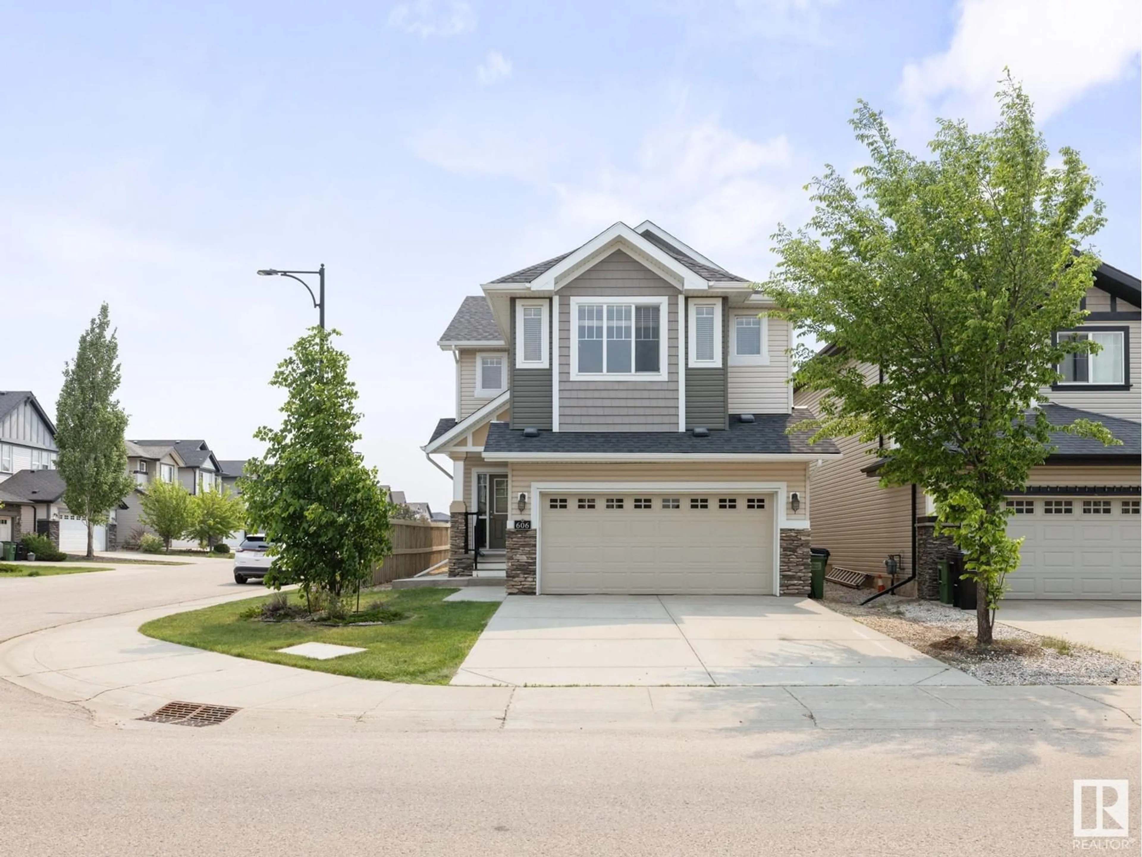 Home with vinyl exterior material, street for SW - 606 ALLARD BV, Edmonton Alberta T6W0W8