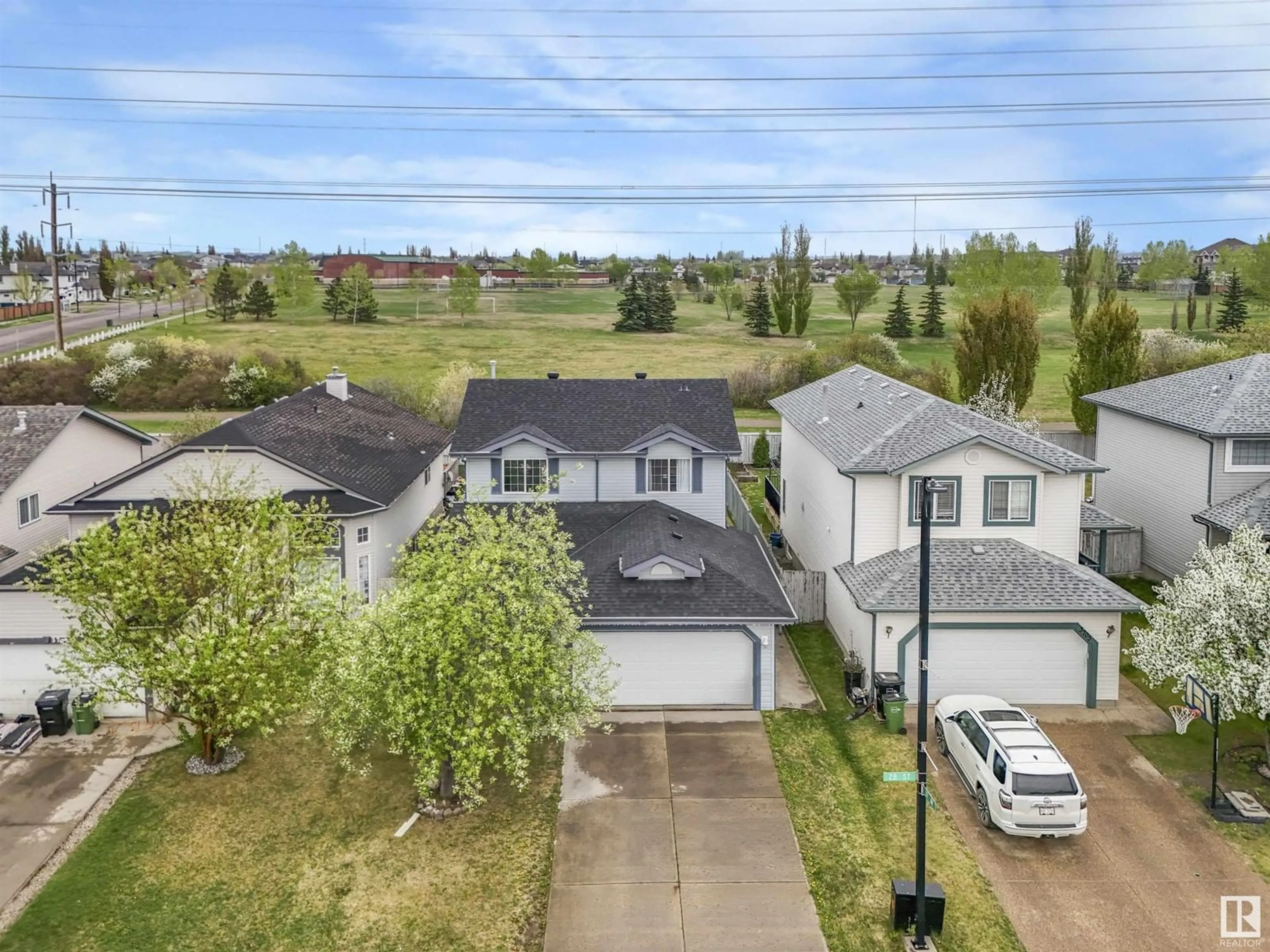 A pic from outside/outdoor area/front of a property/back of a property/a pic from drone, street for 3707 28 ST, Edmonton Alberta T6T1N3