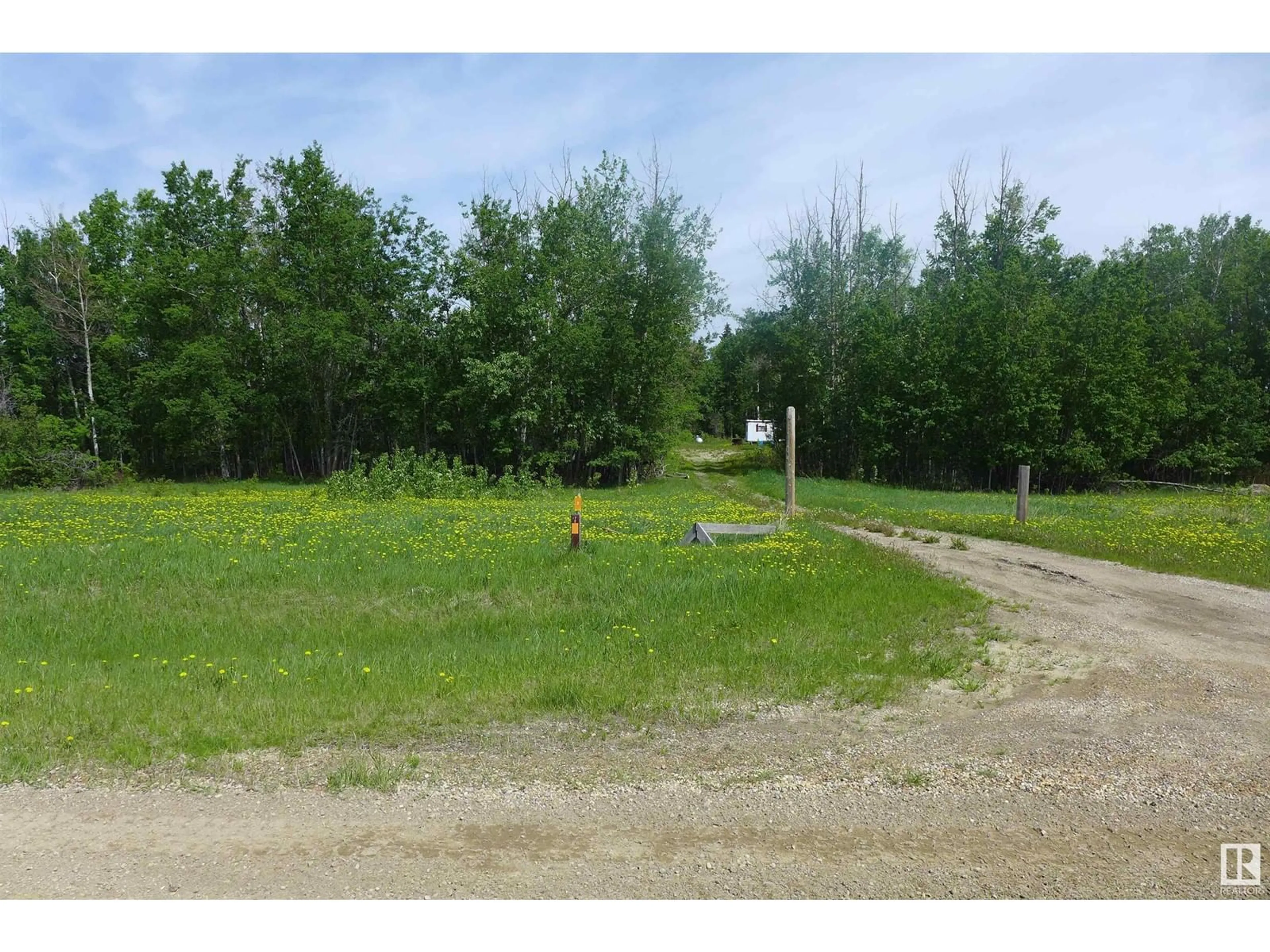 A pic from outside/outdoor area/front of a property/back of a property/a pic from drone, forest/trees view for 5430 HGHWAY 16, Rural Parkland County Alberta T0E0W0