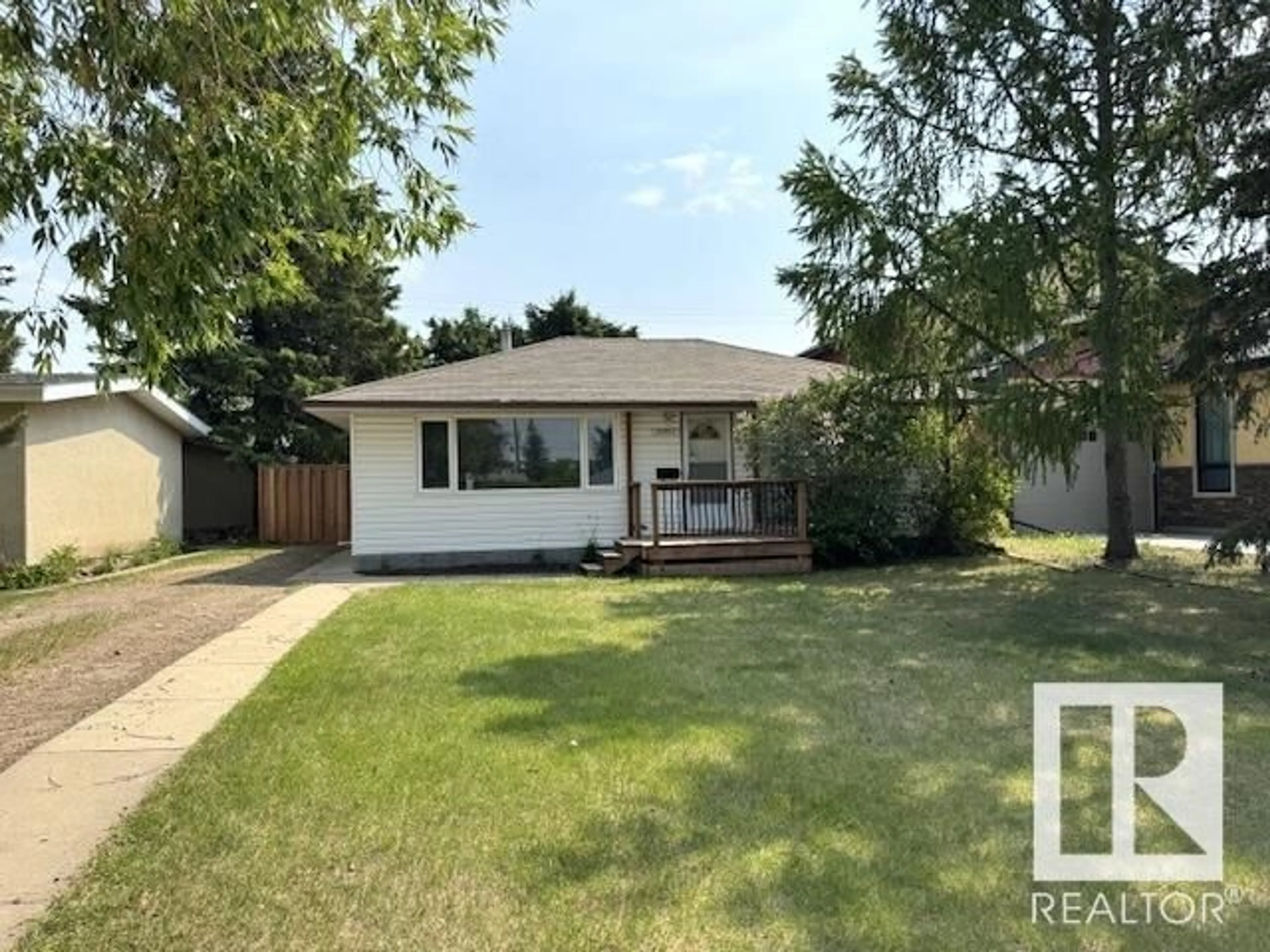 Home with vinyl exterior material, street for NW - 10921 157 ST, Edmonton Alberta T5P2W2