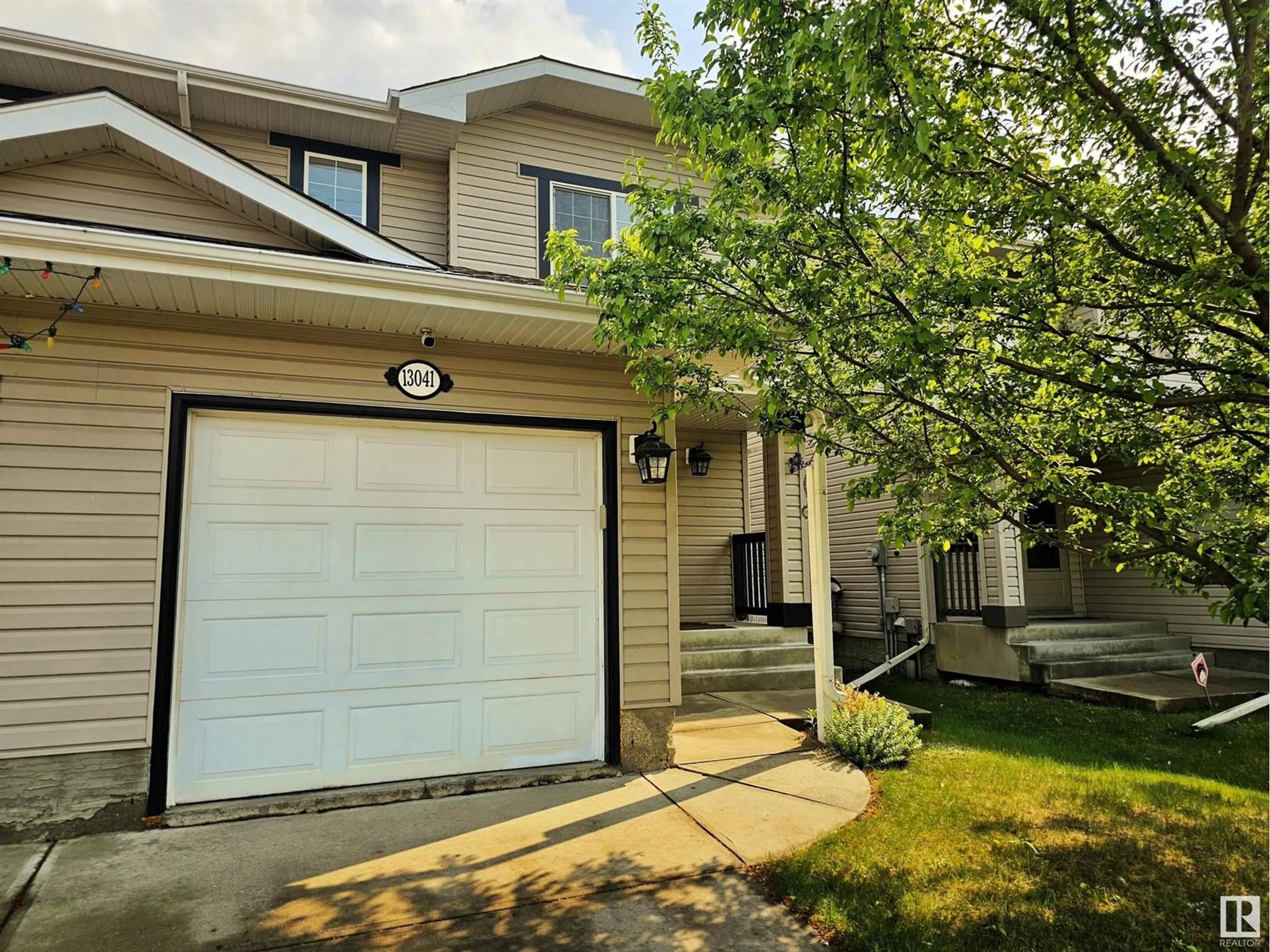 Home with vinyl exterior material, street for 13041 162A AV, Edmonton Alberta T6V1V5