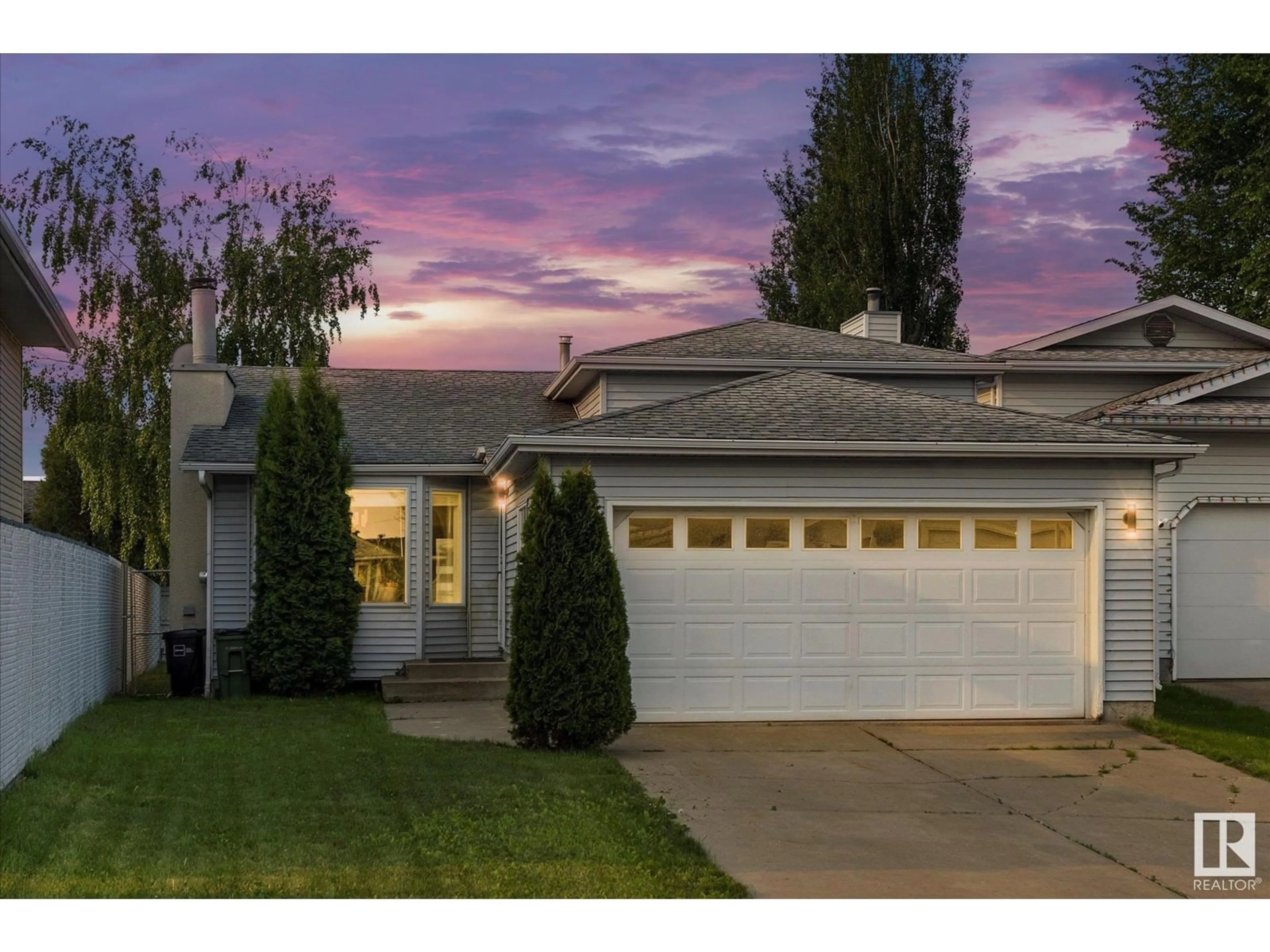 Home with vinyl exterior material, street for 9111 175A AV, Edmonton Alberta T5Z2M1
