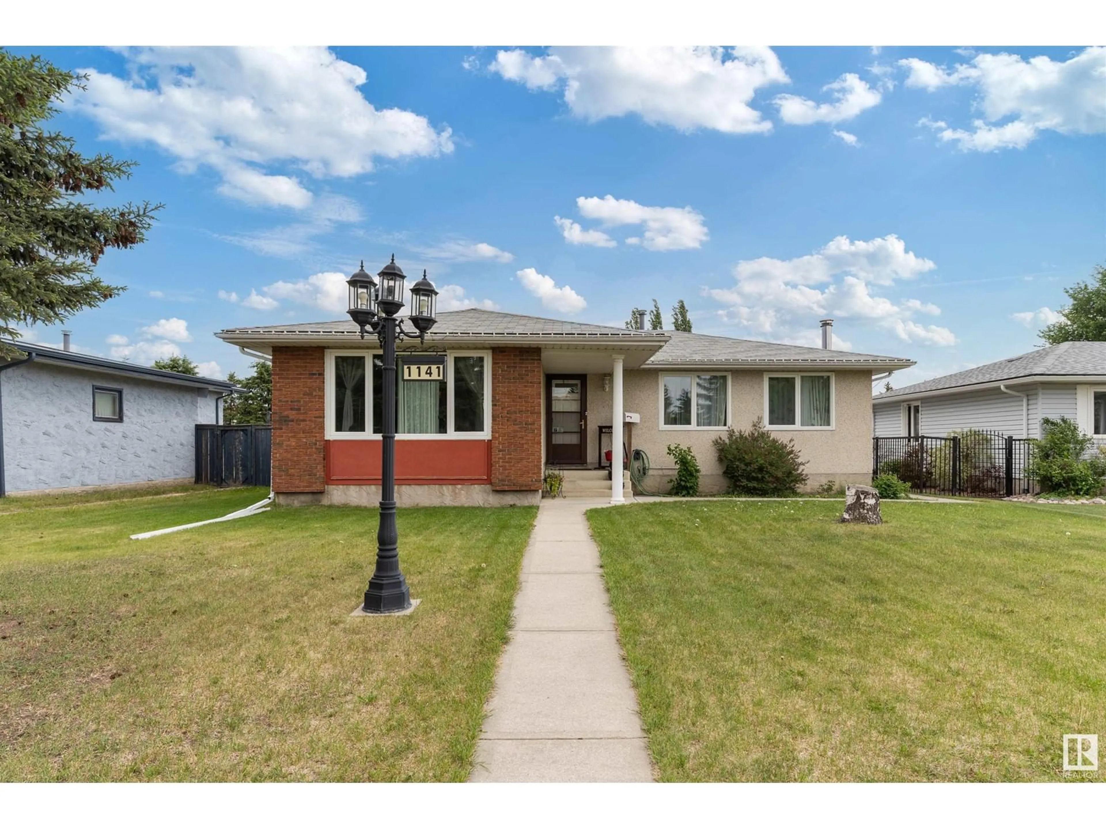 Home with brick exterior material, street for 1141 77 ST, Edmonton Alberta T6K3G4