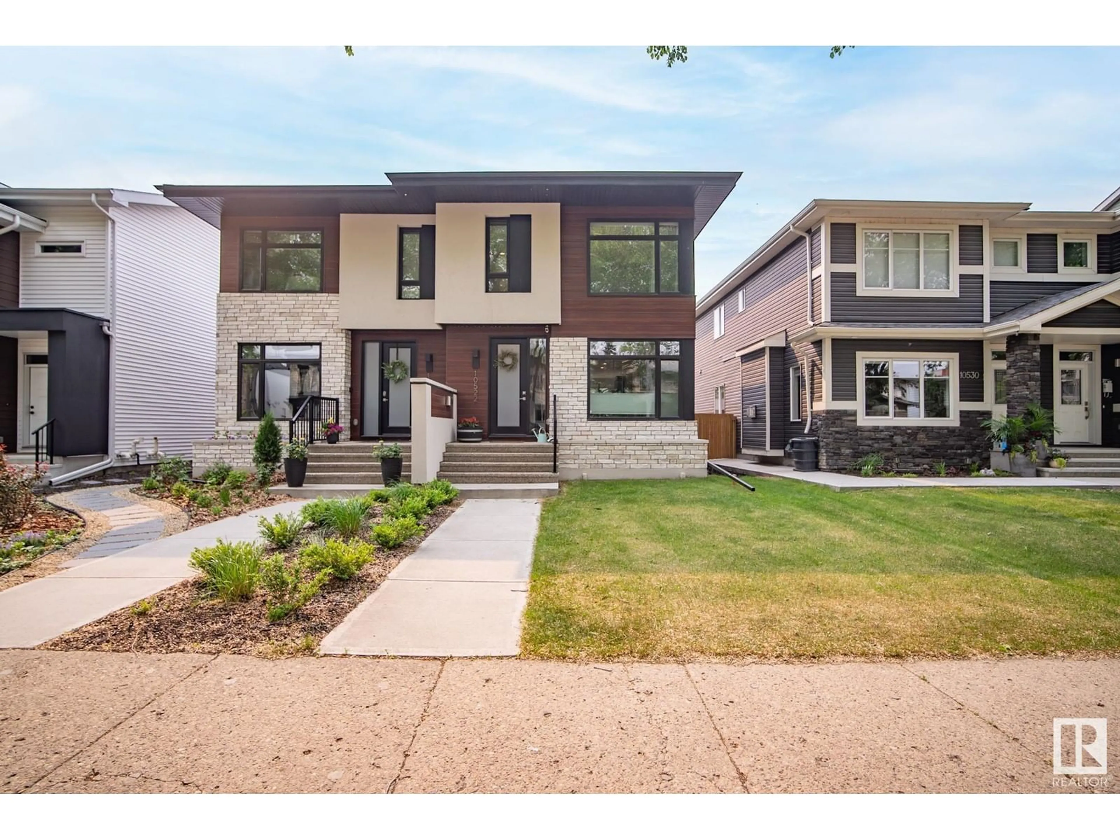 Home with brick exterior material, street for NW - 10522 83 ST, Edmonton Alberta T6A3P4